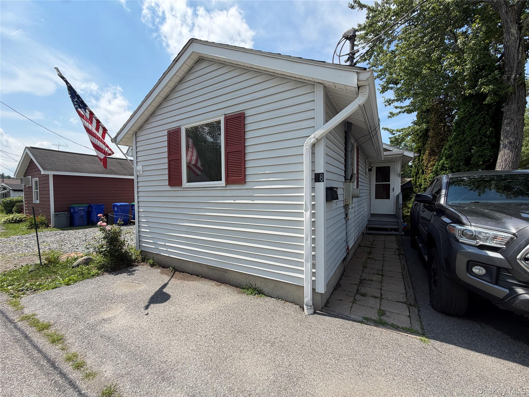 Lovely custom designed home with cathedral ceilings located on the can...