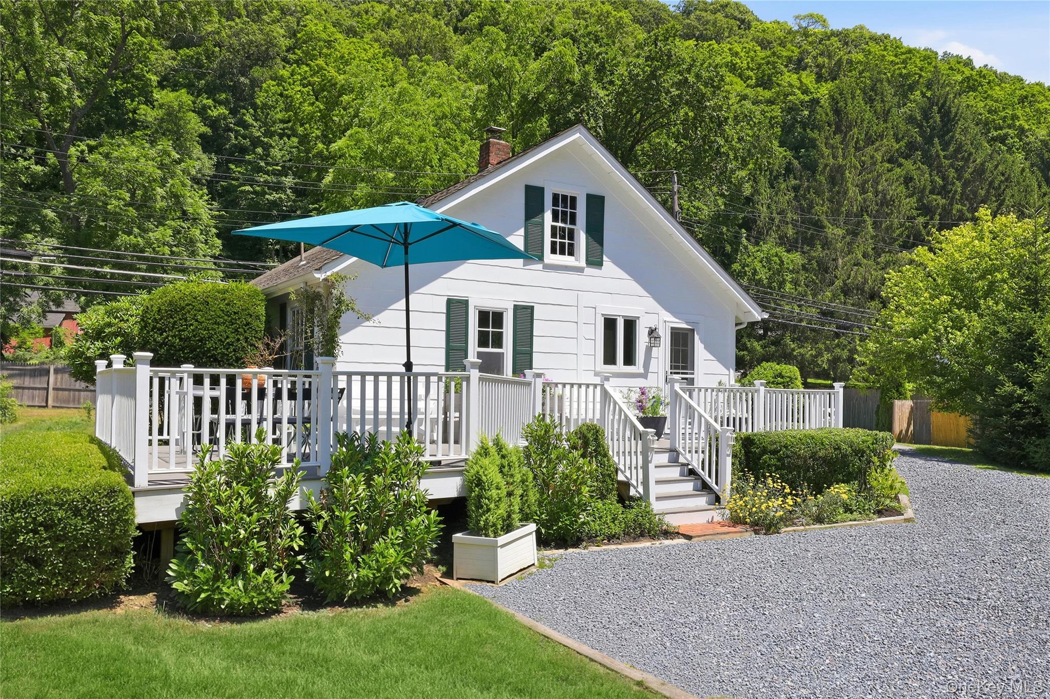 Nestled on a picturesque three-quarter-acre in the heart of Bedford Vi...
