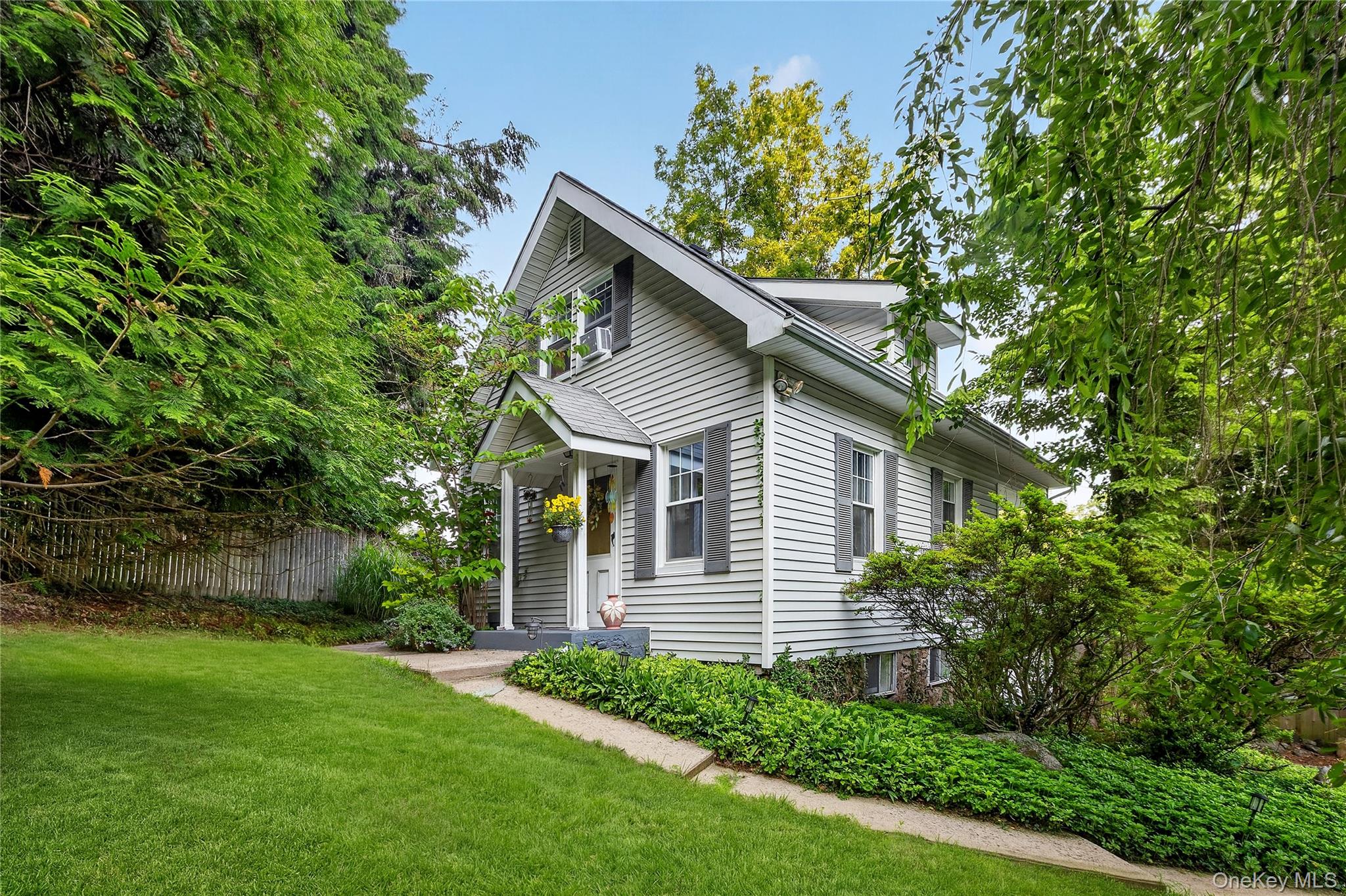 The charm of this home is truly overwhelming! As you pull onto this sh...