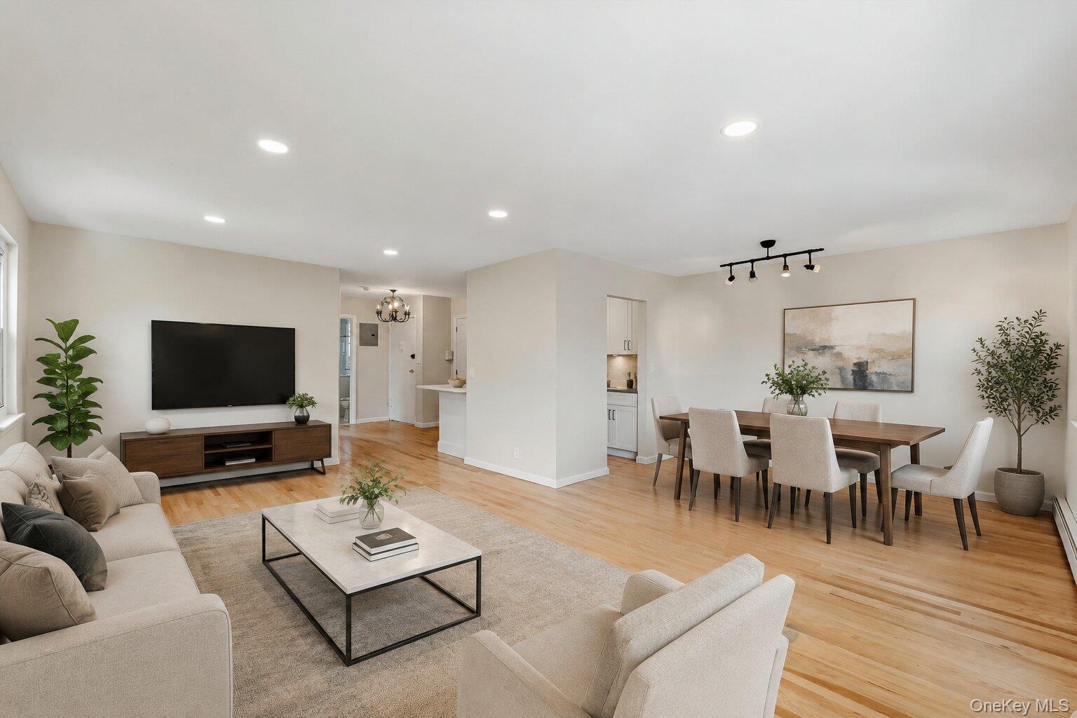 Welcome home to this beautifully renovated top-floor, walkup corner un...