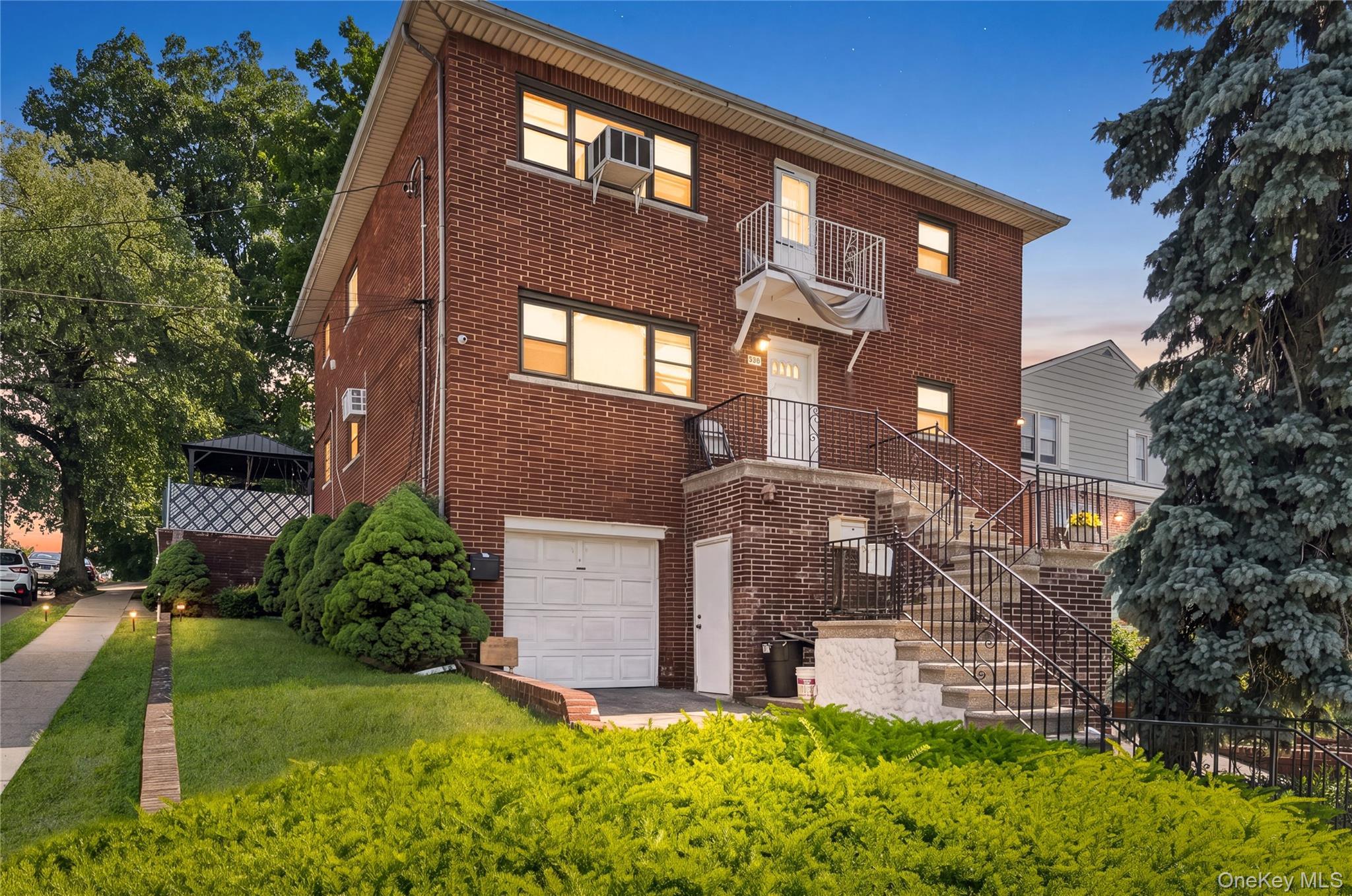 Sunny and spacious Two-Family Brick home situated on a desirable corne...