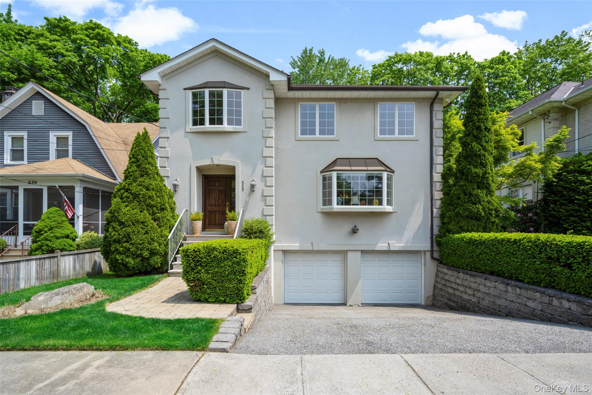 Rye Neck sun-filled Colonial that you will be thrilled to call home. M...