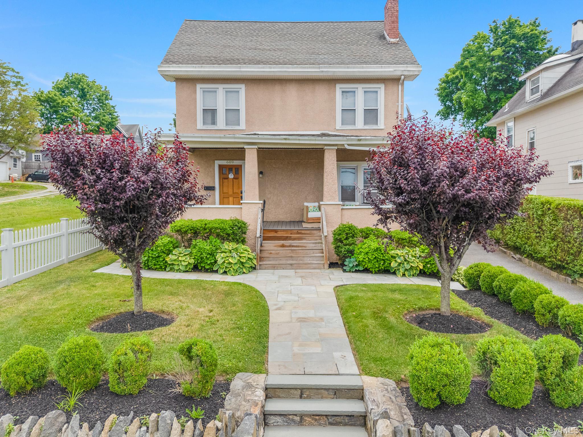 A home where classic Colonial style meets modern-day living. A bluesto...