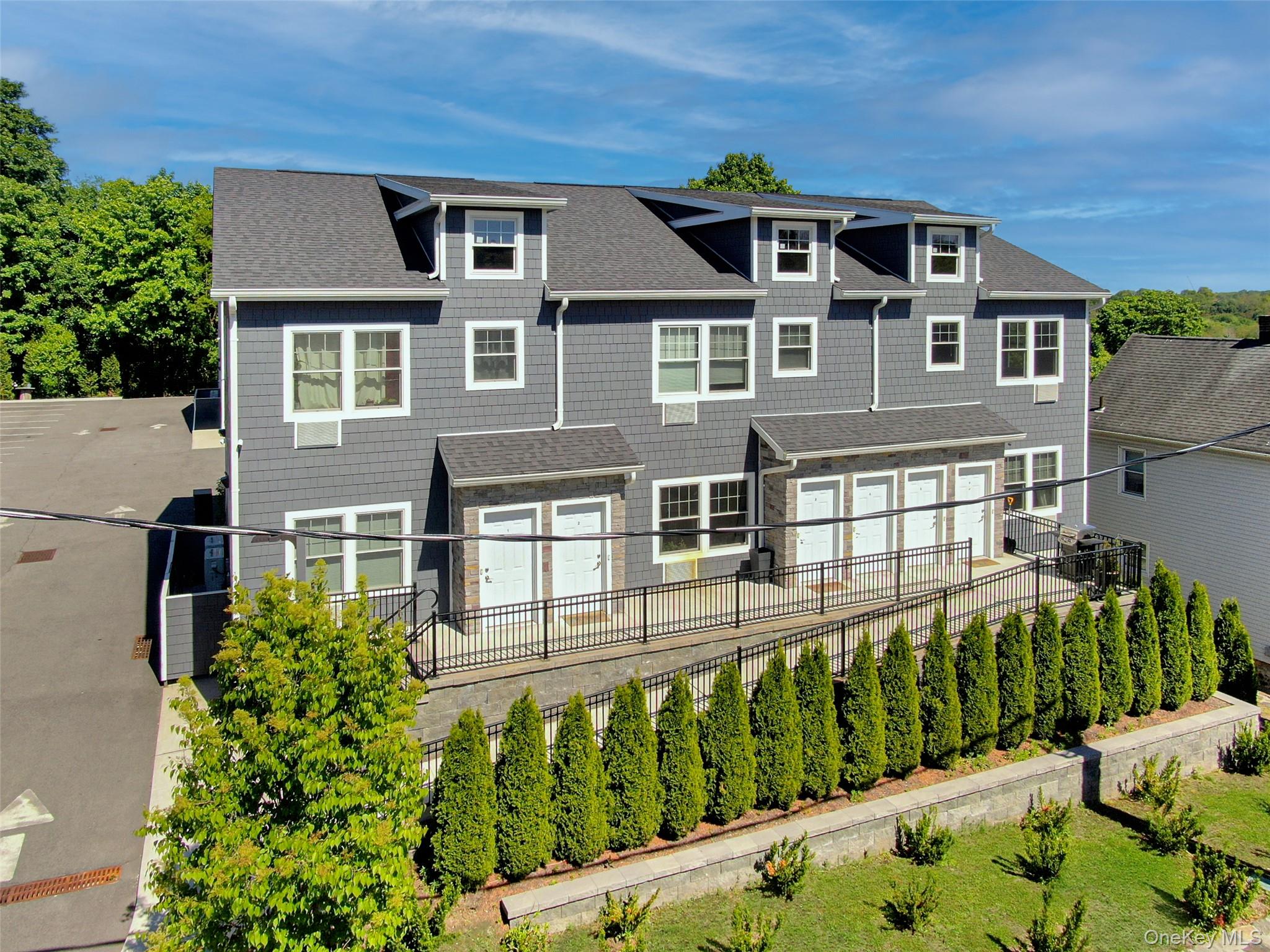 Experience modern living at Kensico Commons, a boutique luxury rental...