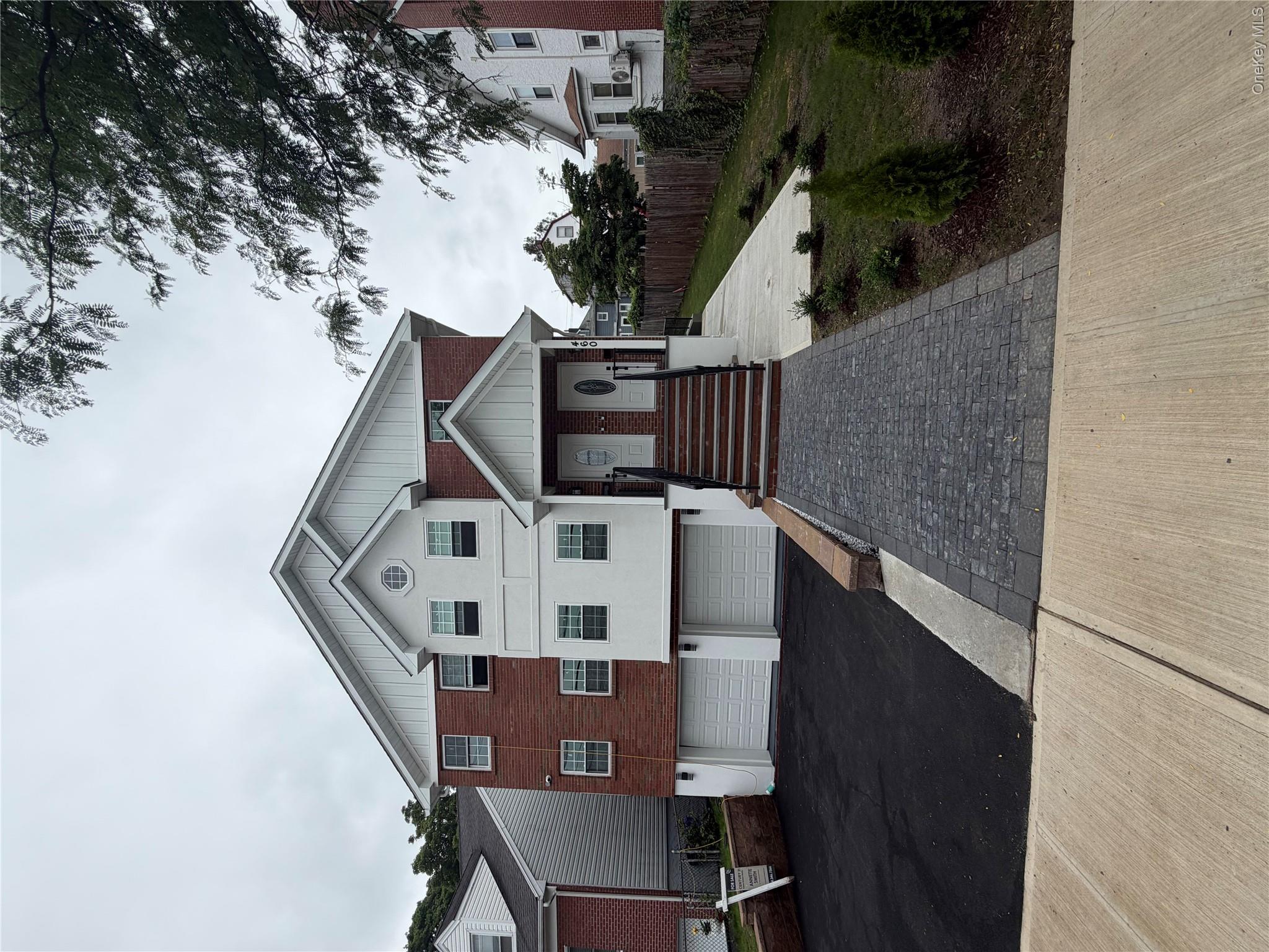 Welcome to this stunning, newly built, modern 2 family home with smart...
