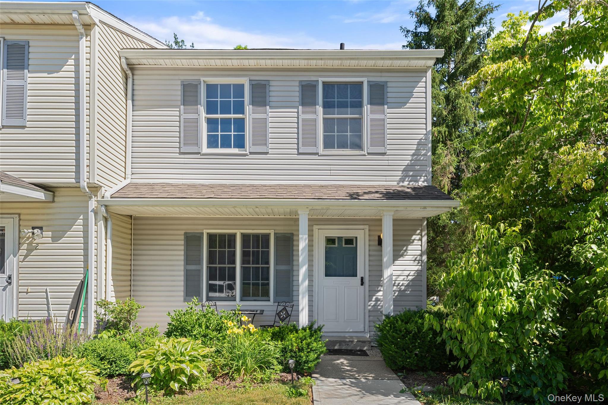 Sun-drenched, fully renovated tri-level end-unit townhouse in a prime...