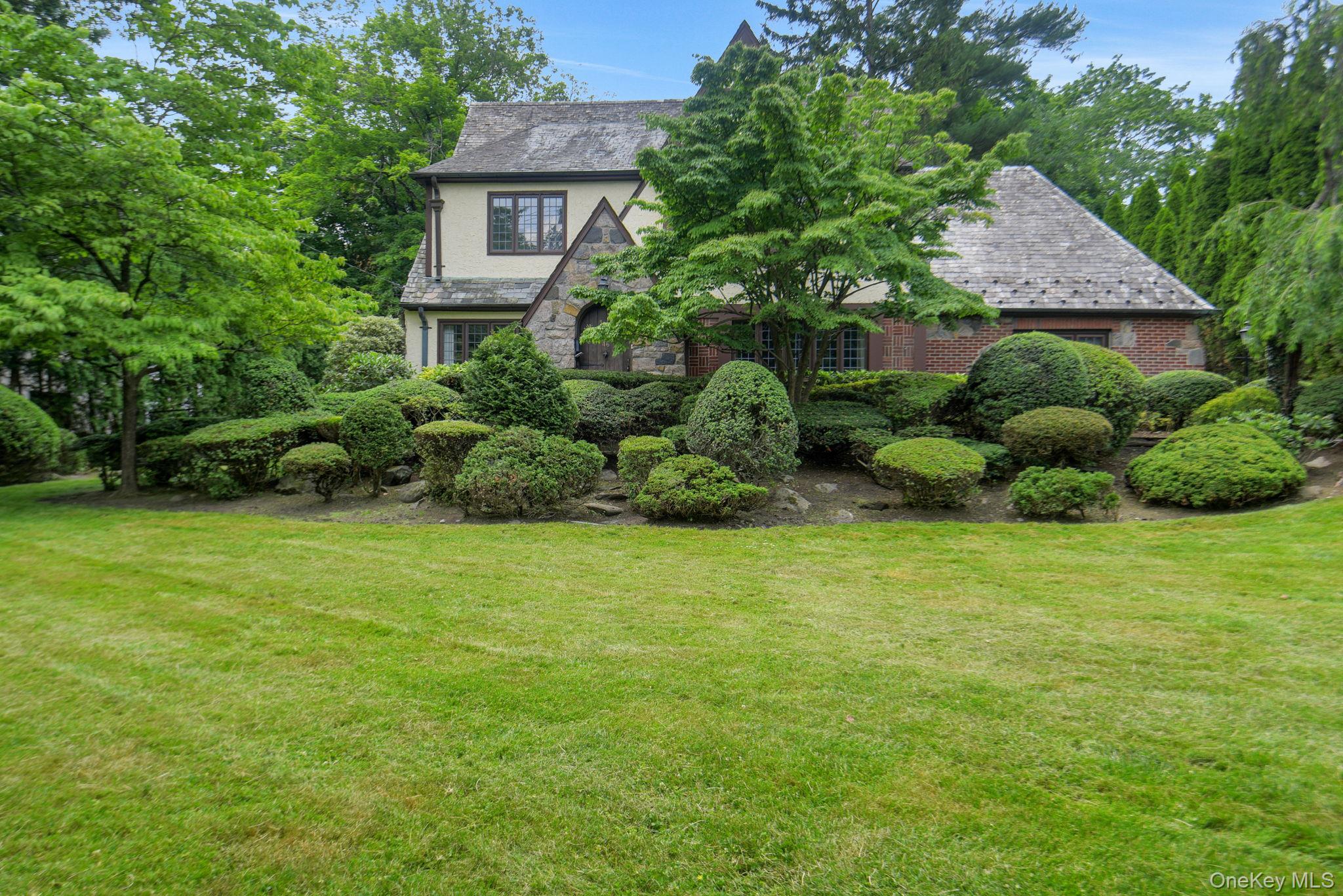 Welcome to this timeless 1920s Tudor in the coveted Fox Meadow neighbo...