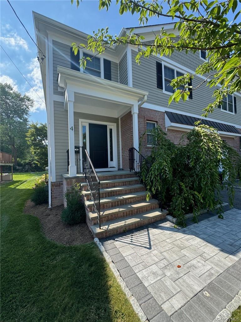 Experience luxury living in the heart of Harrison with this bright and...