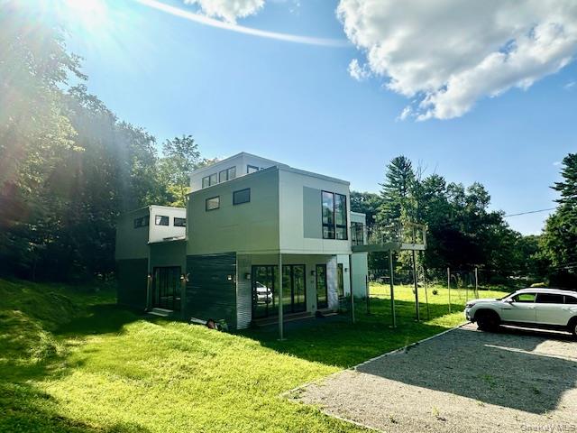 This exceptional Modern four bedroom contemporary home, designed by re...