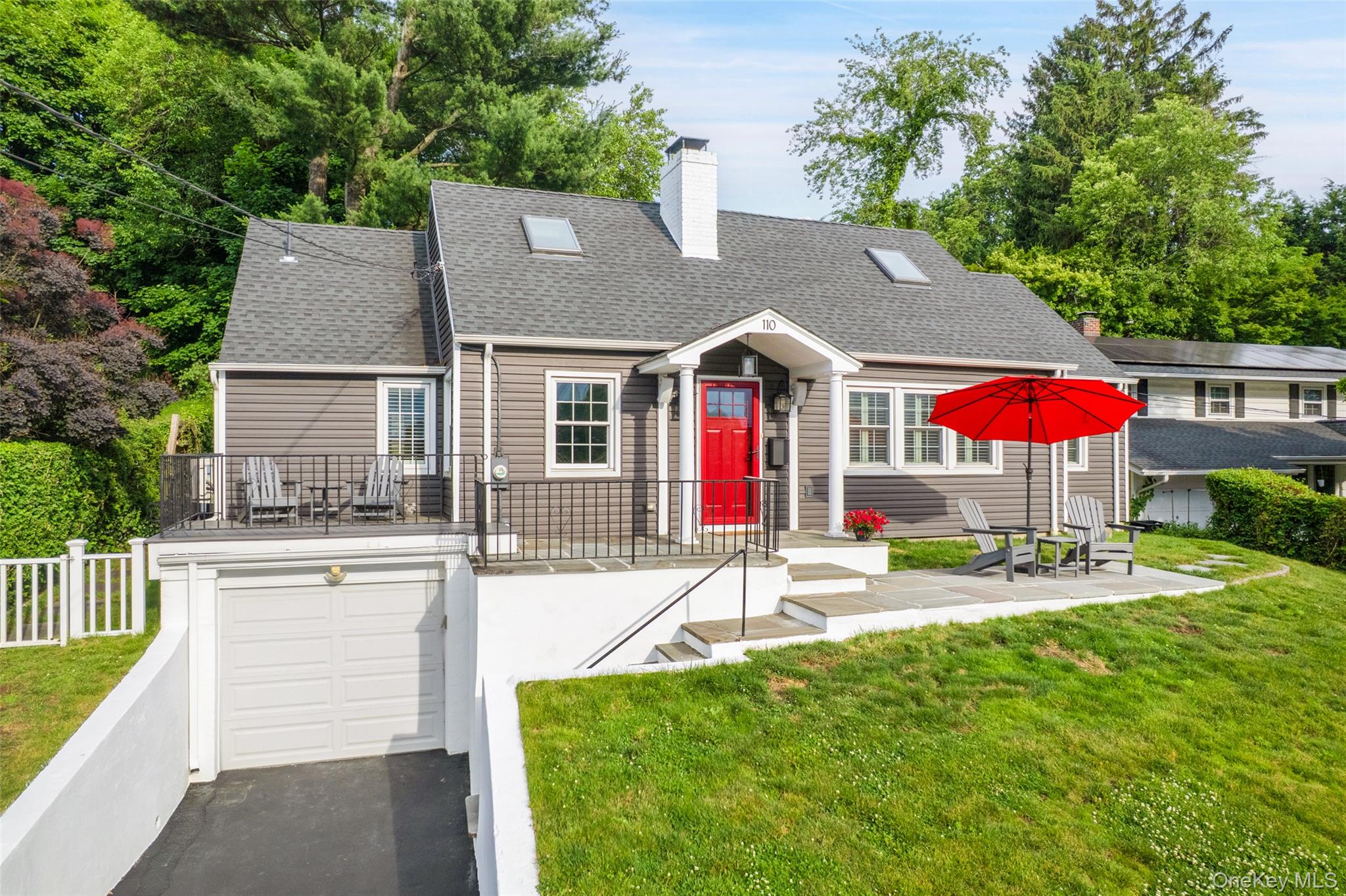 Experience the Rivertown lifestyle in the little grey house on the hil...