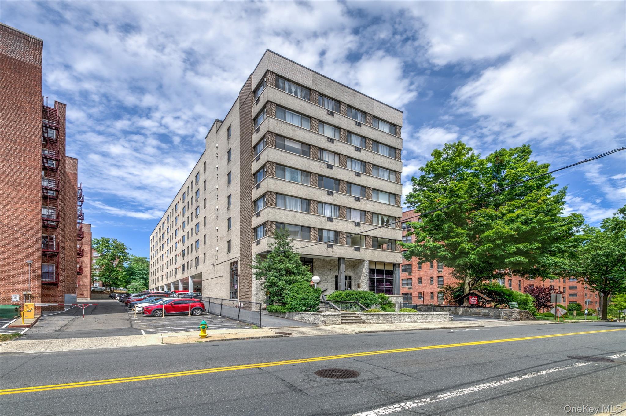 Bright spacious corner unit close to train.  Many closets.  Walk to do...