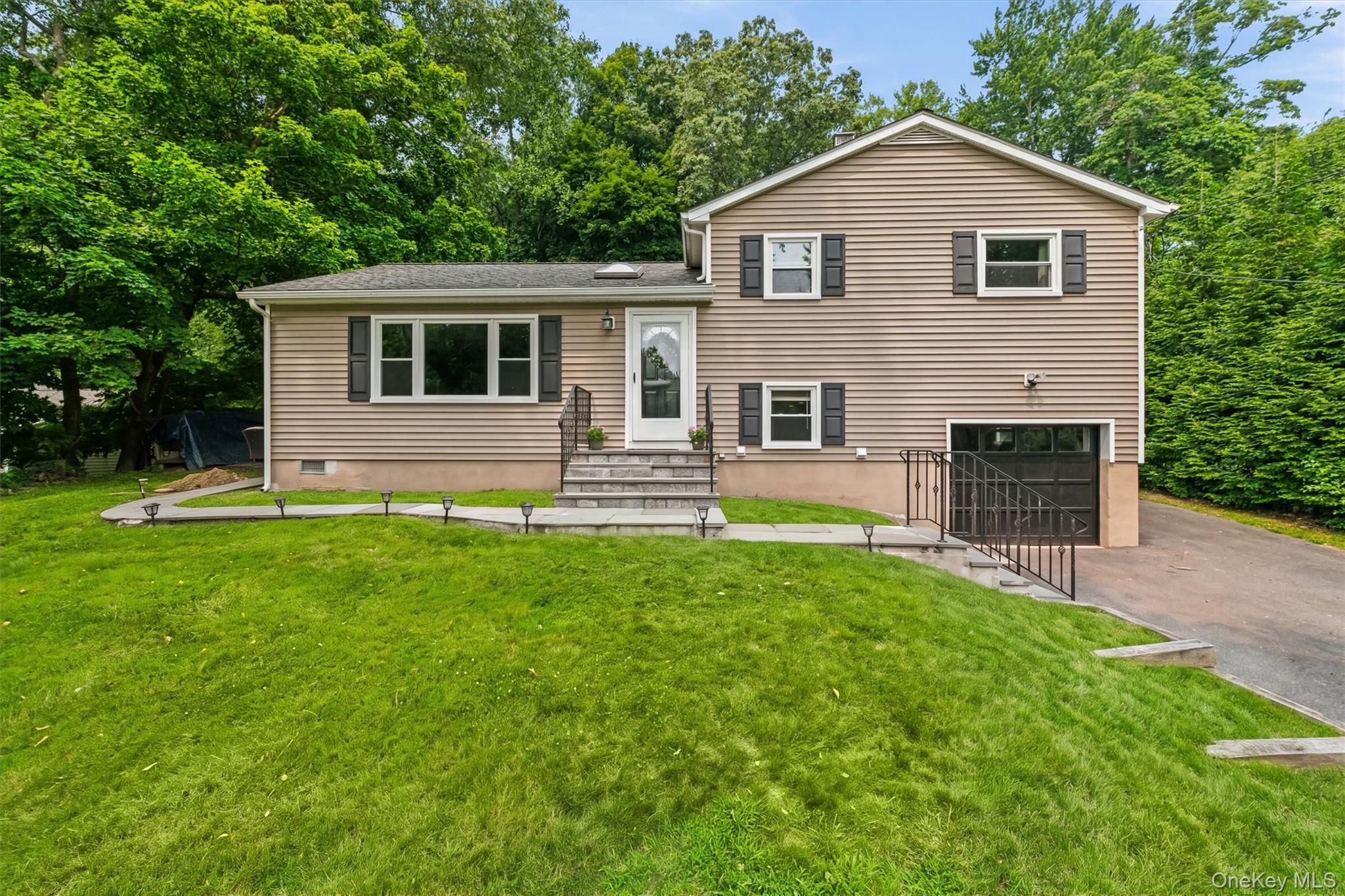 Welcome to 17 Ridge Road, a charming three-bedroom home offering spaci...