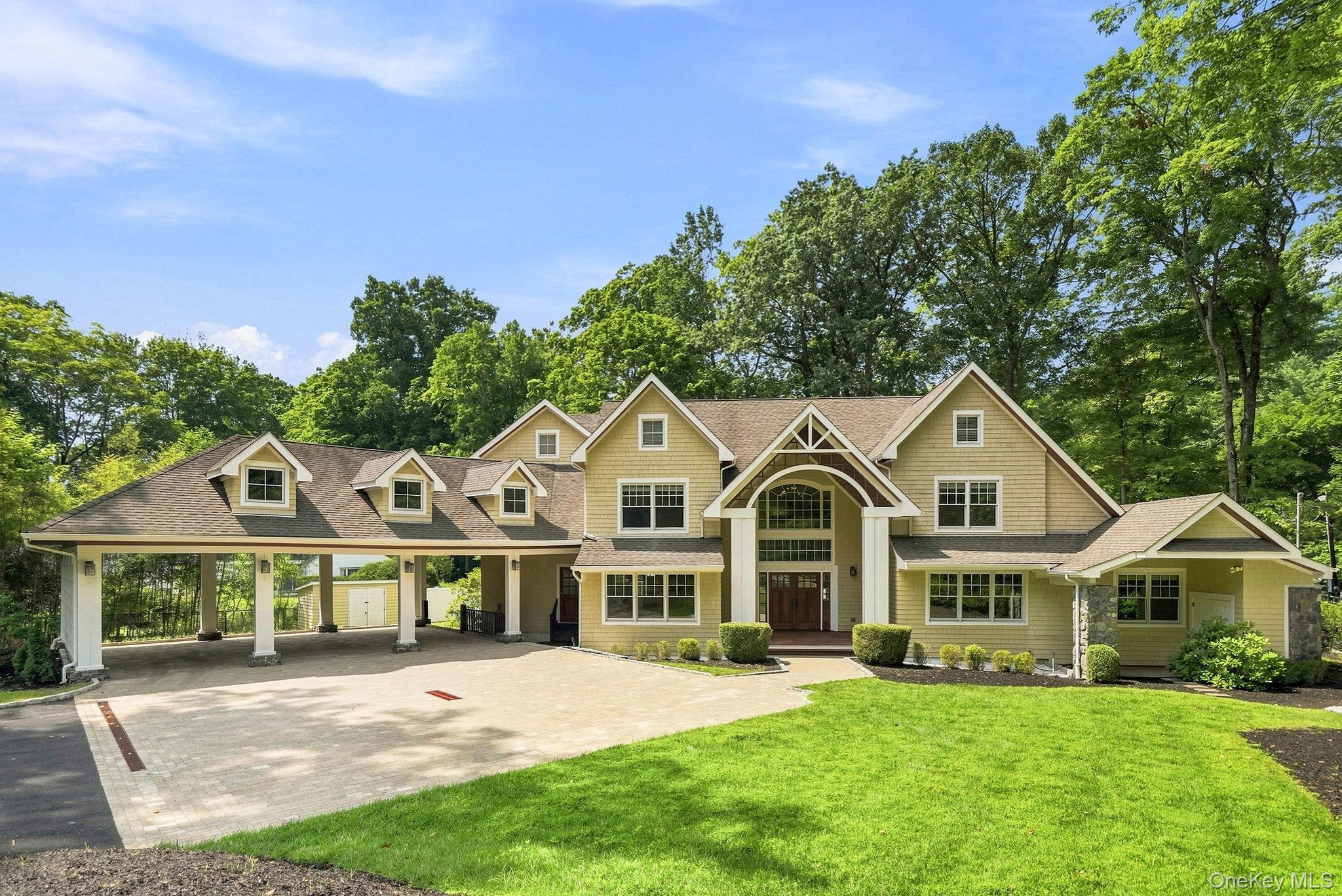 Experience Modern Living in this Beautifully Remodeled New England-Sty...