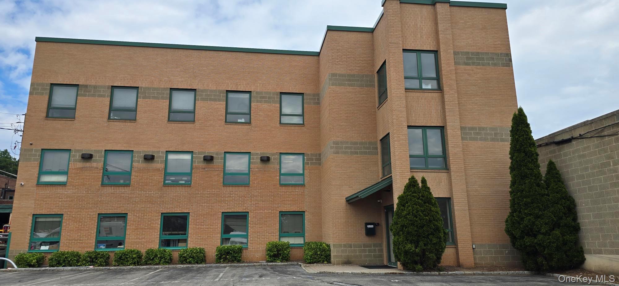 This property consists of a three-story detached office building, on s...