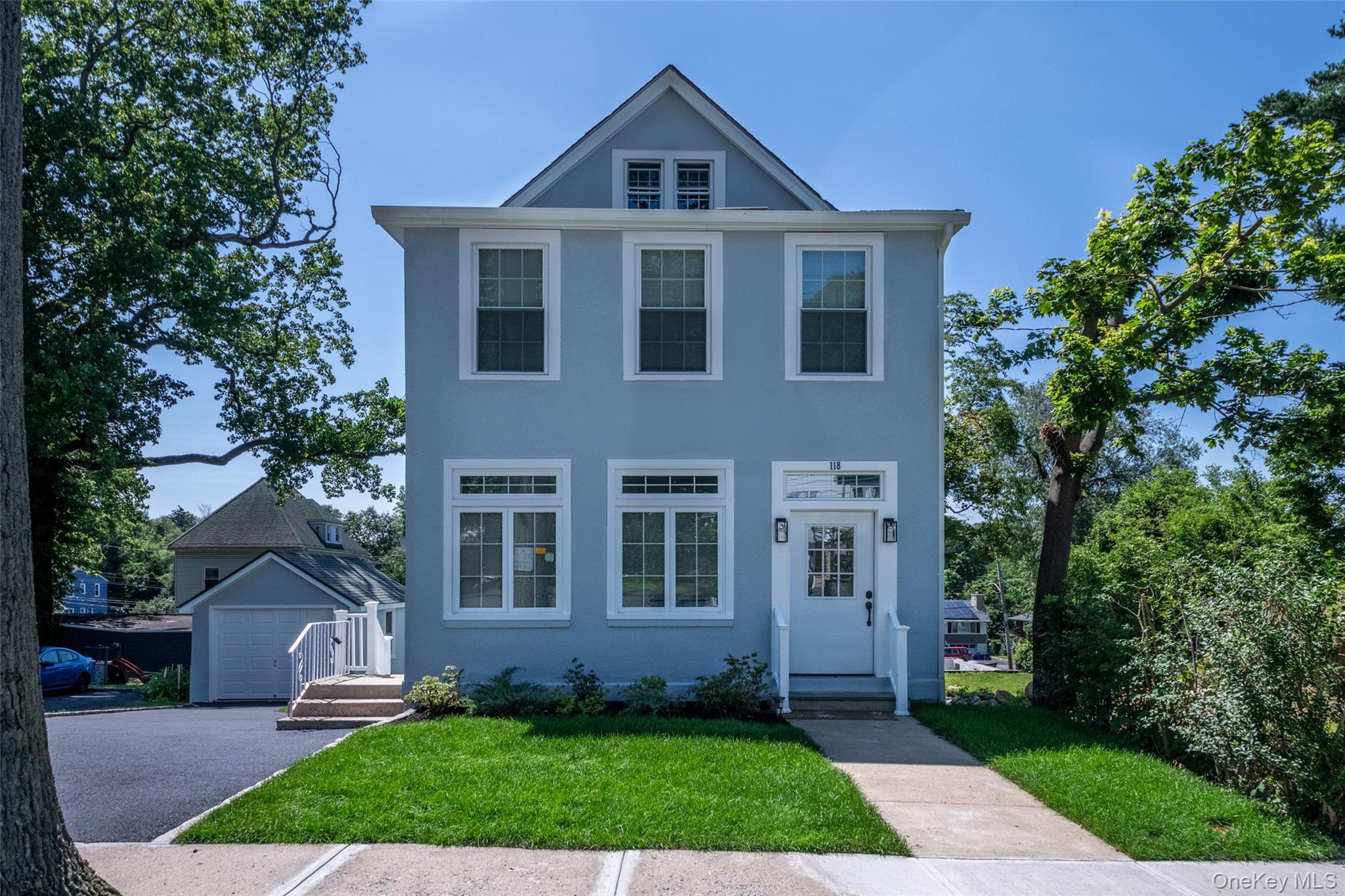 Exceptional opportunity to own a beautifully updated two-family home o...