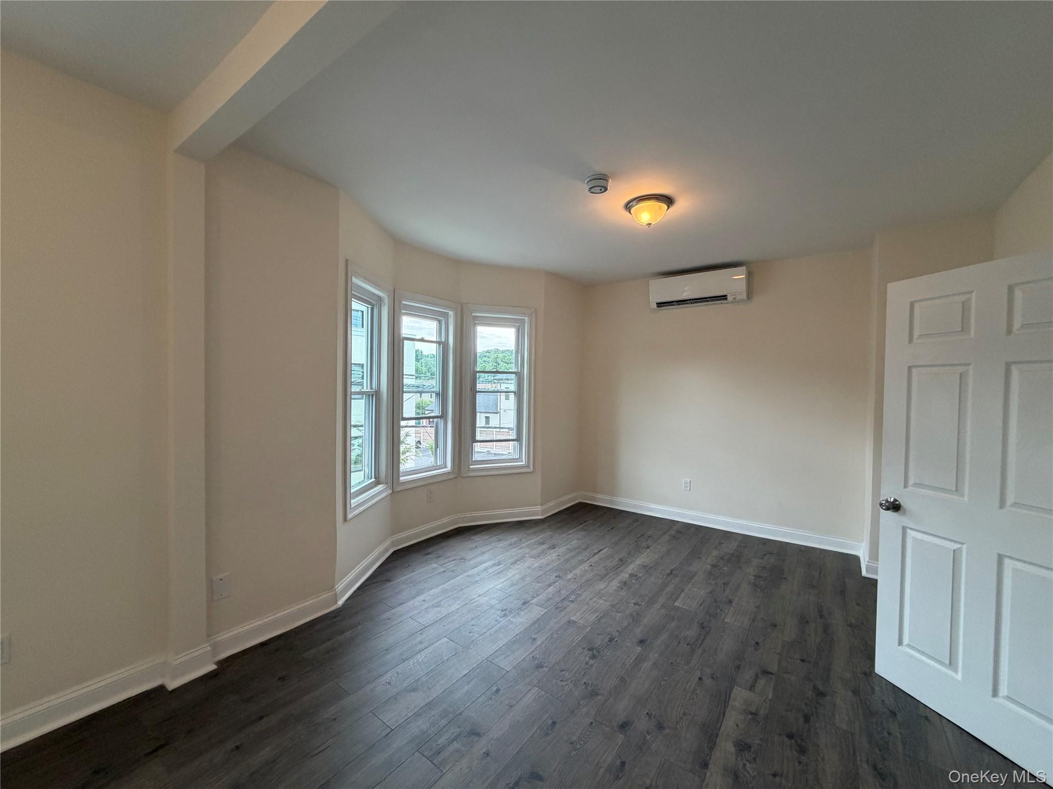 This beautifully renovated three-bedroom, two-bath apartment offers th...