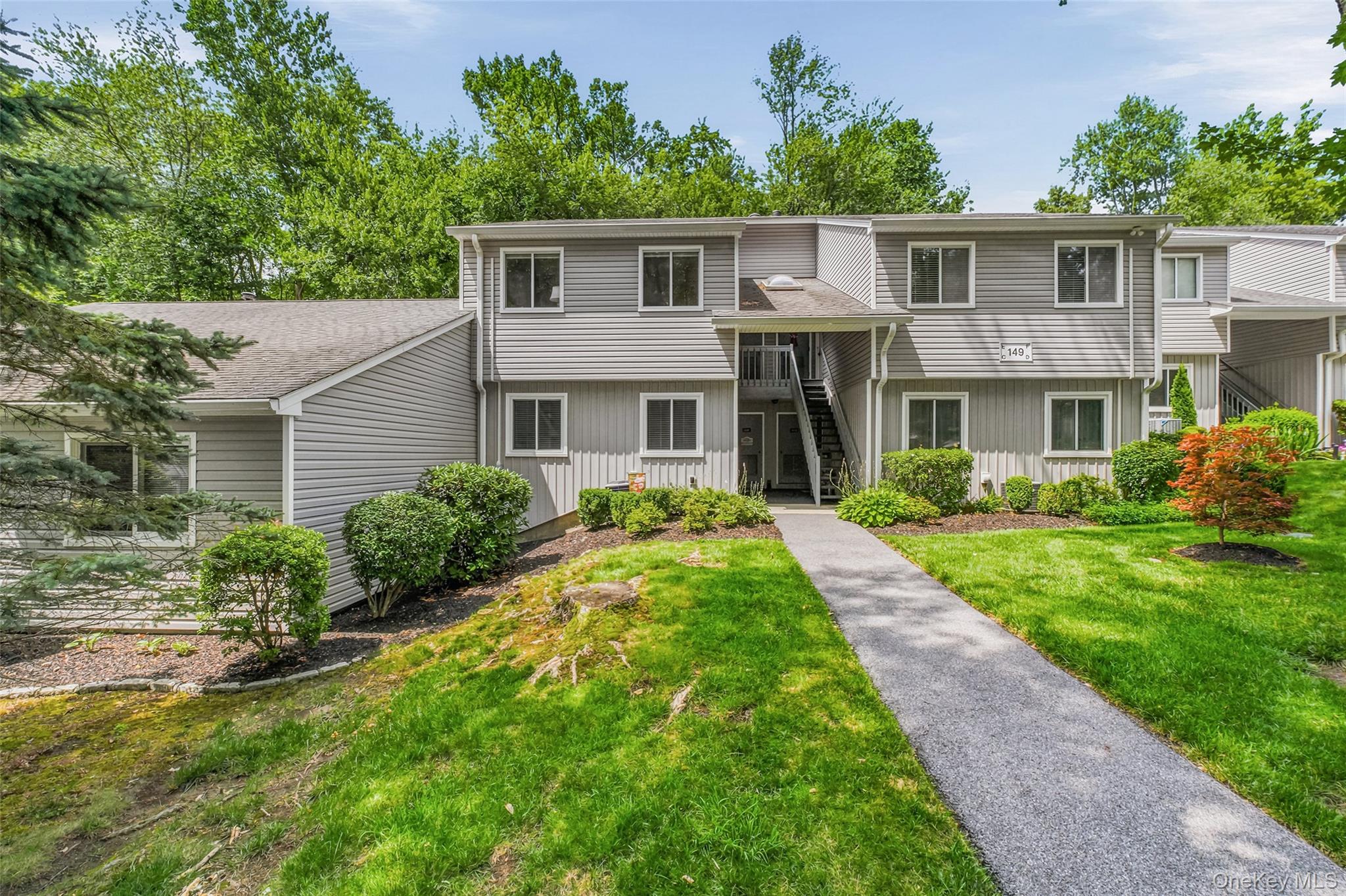 Move right into this impeccably updated end unit condominium offering...
