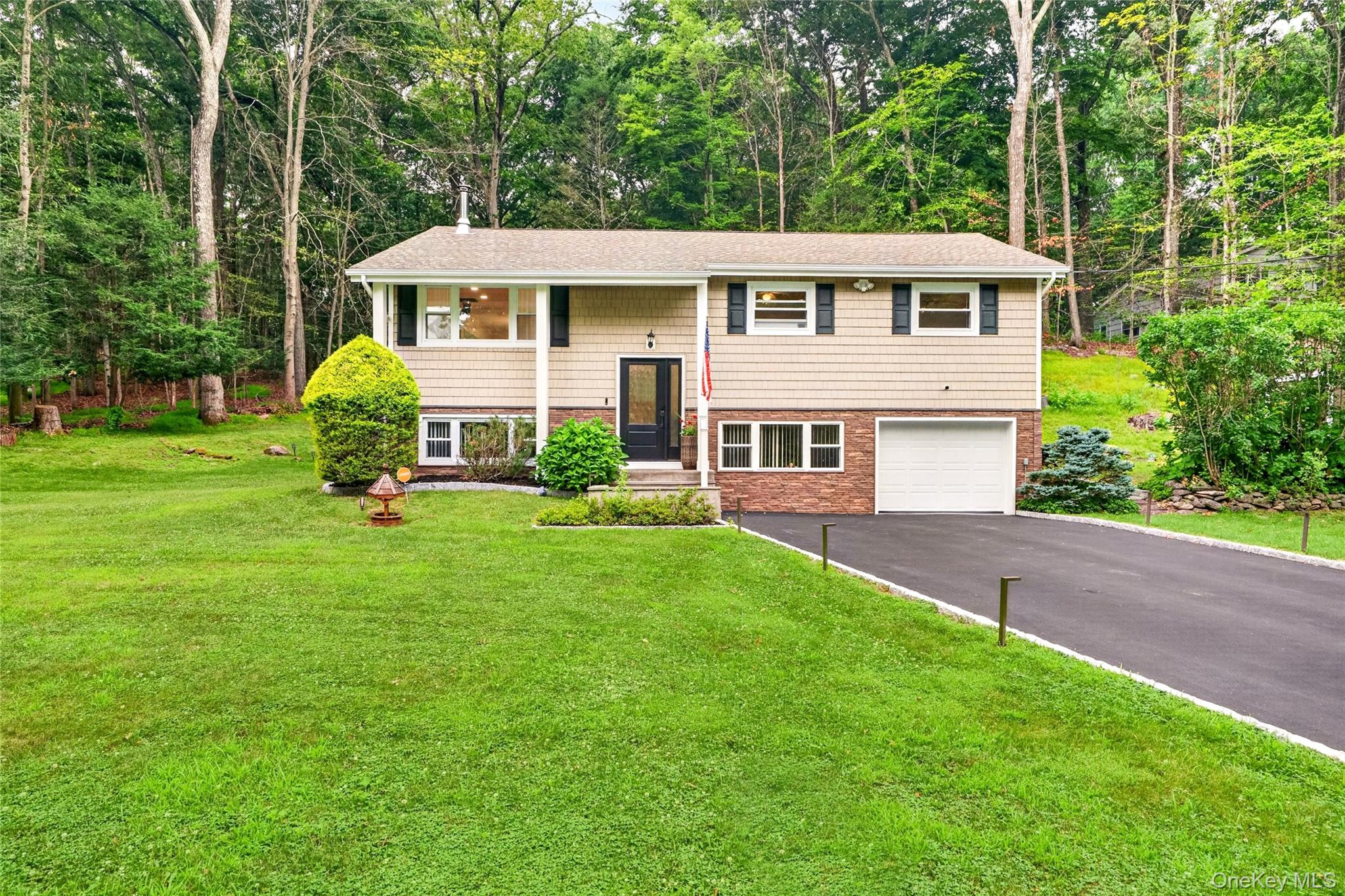 Welcome home to this beautifully updated split-level ranch offering th...