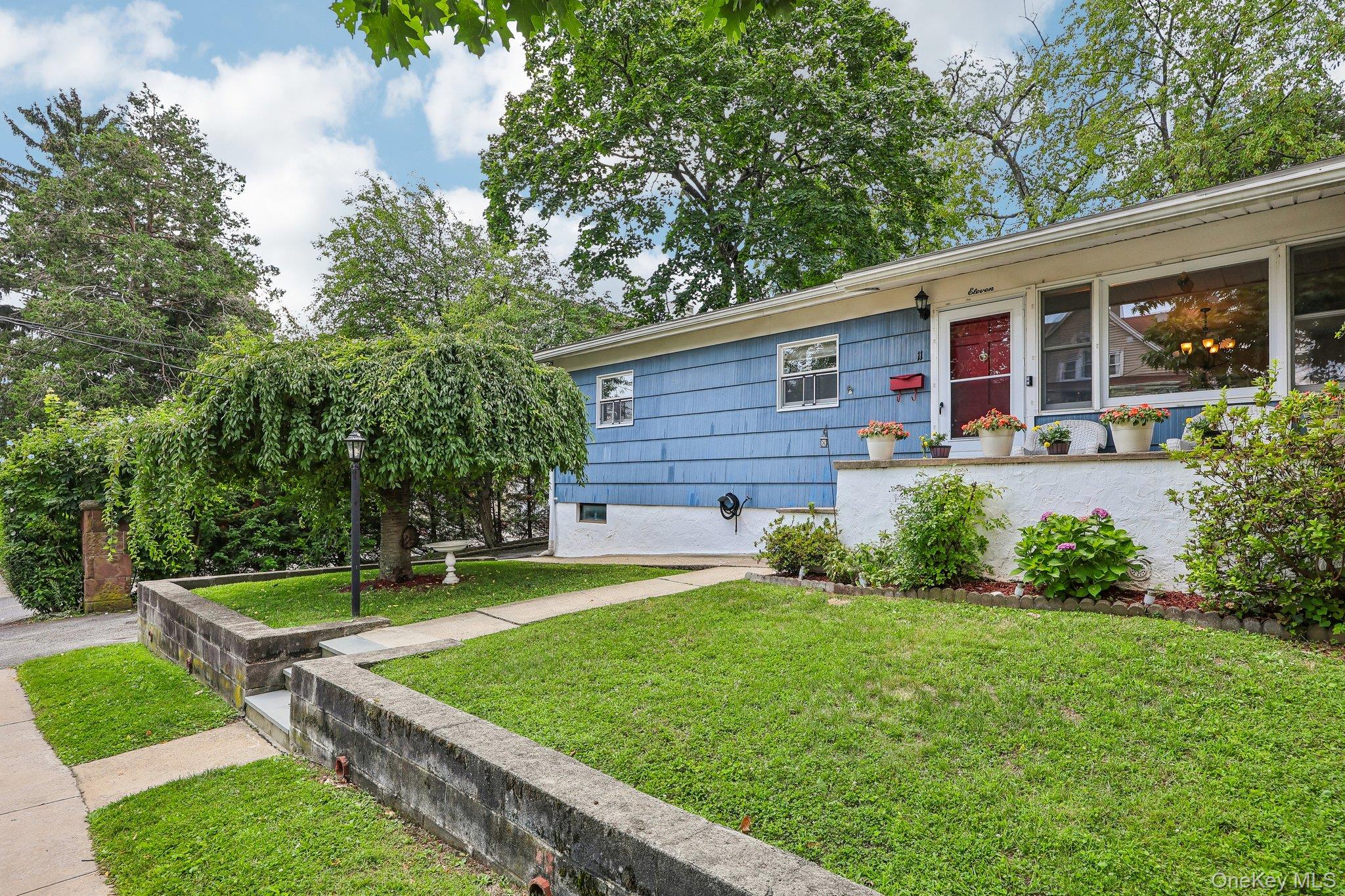 This charming attached ranch offers the ease of one-level living. This...