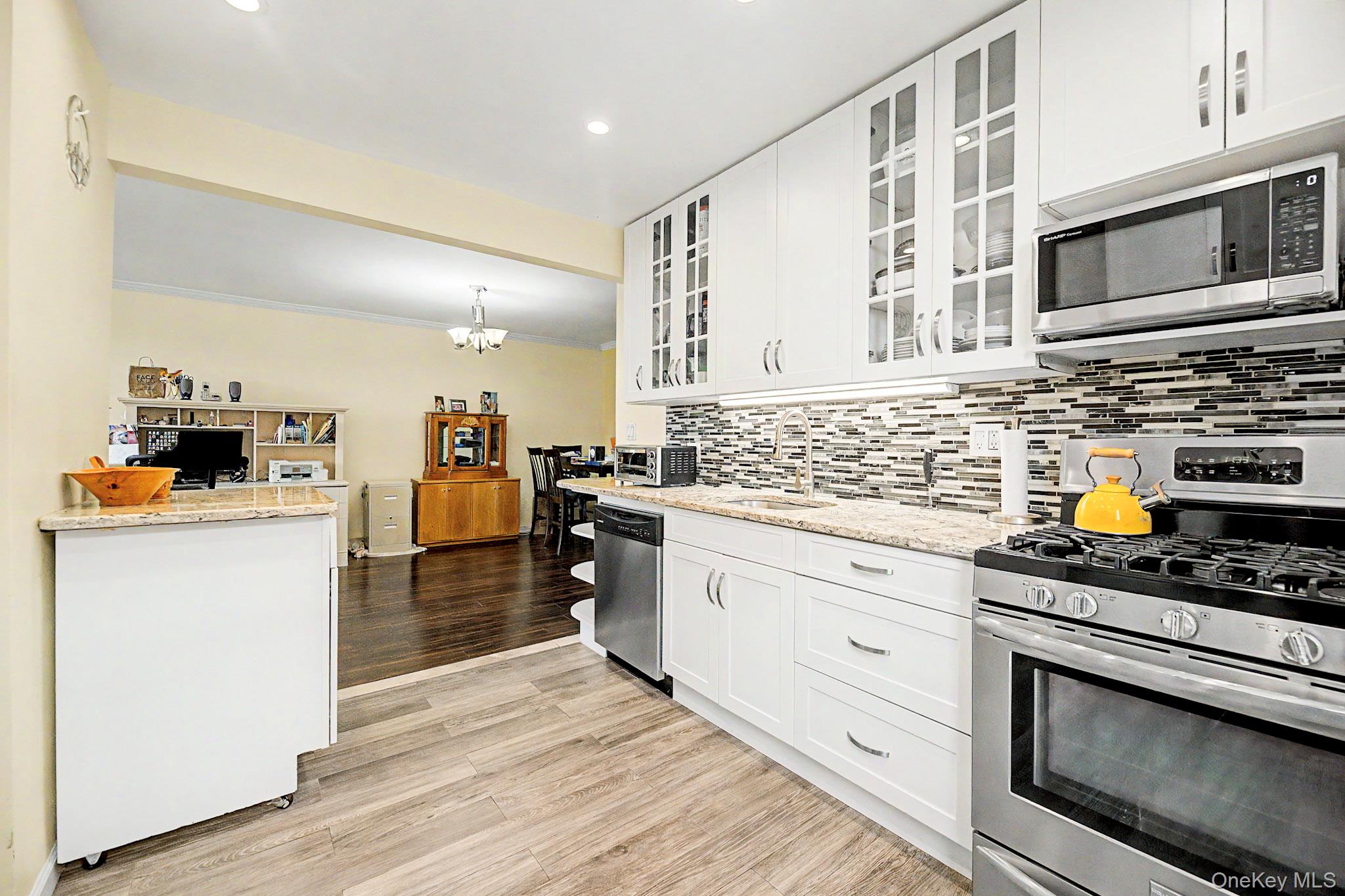 Welcome to this beautifully renovated top floor Junior Four-4 unit at...