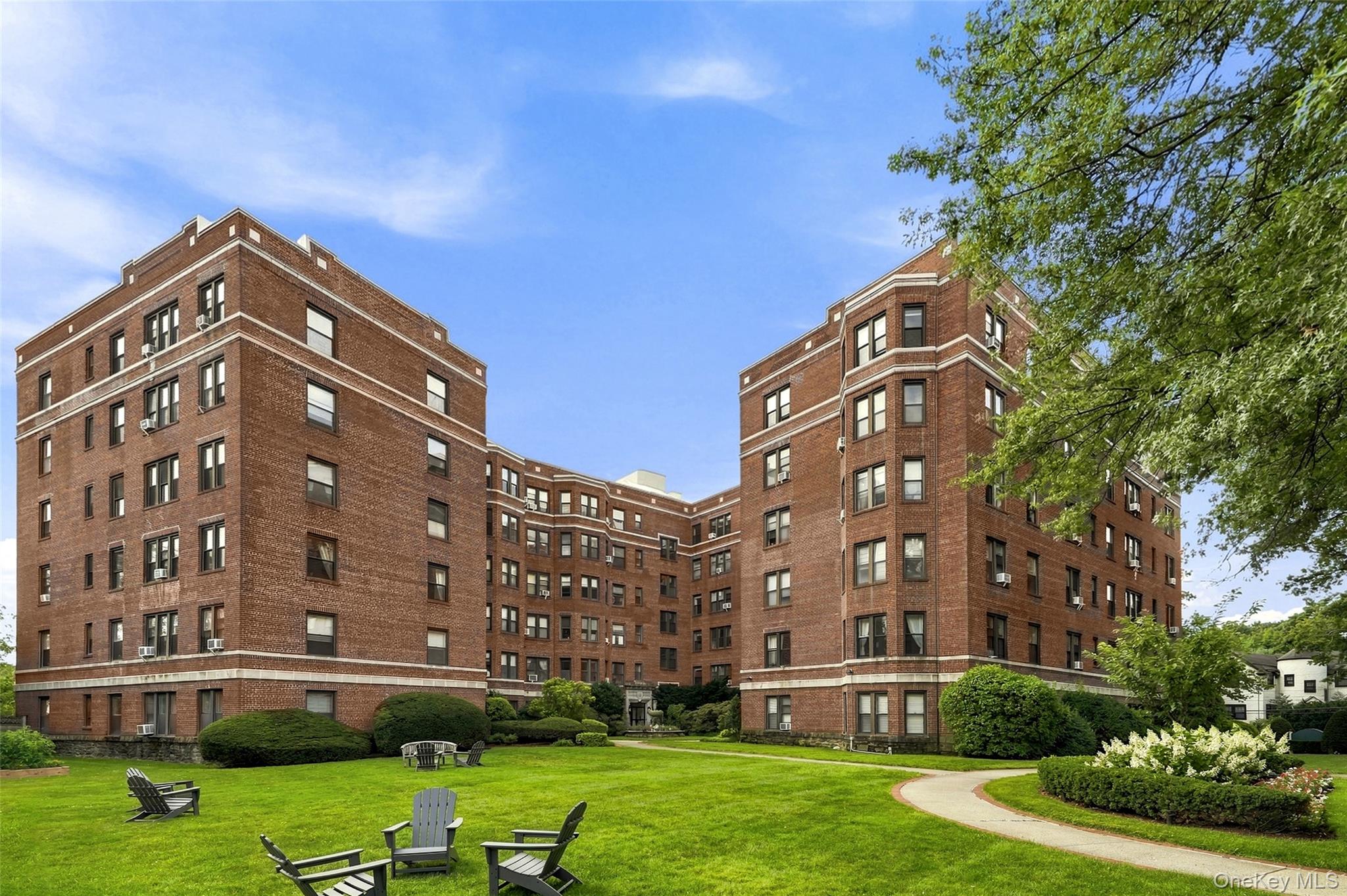 Welcome to this spacious two bedroom, two bath midrise building locate...