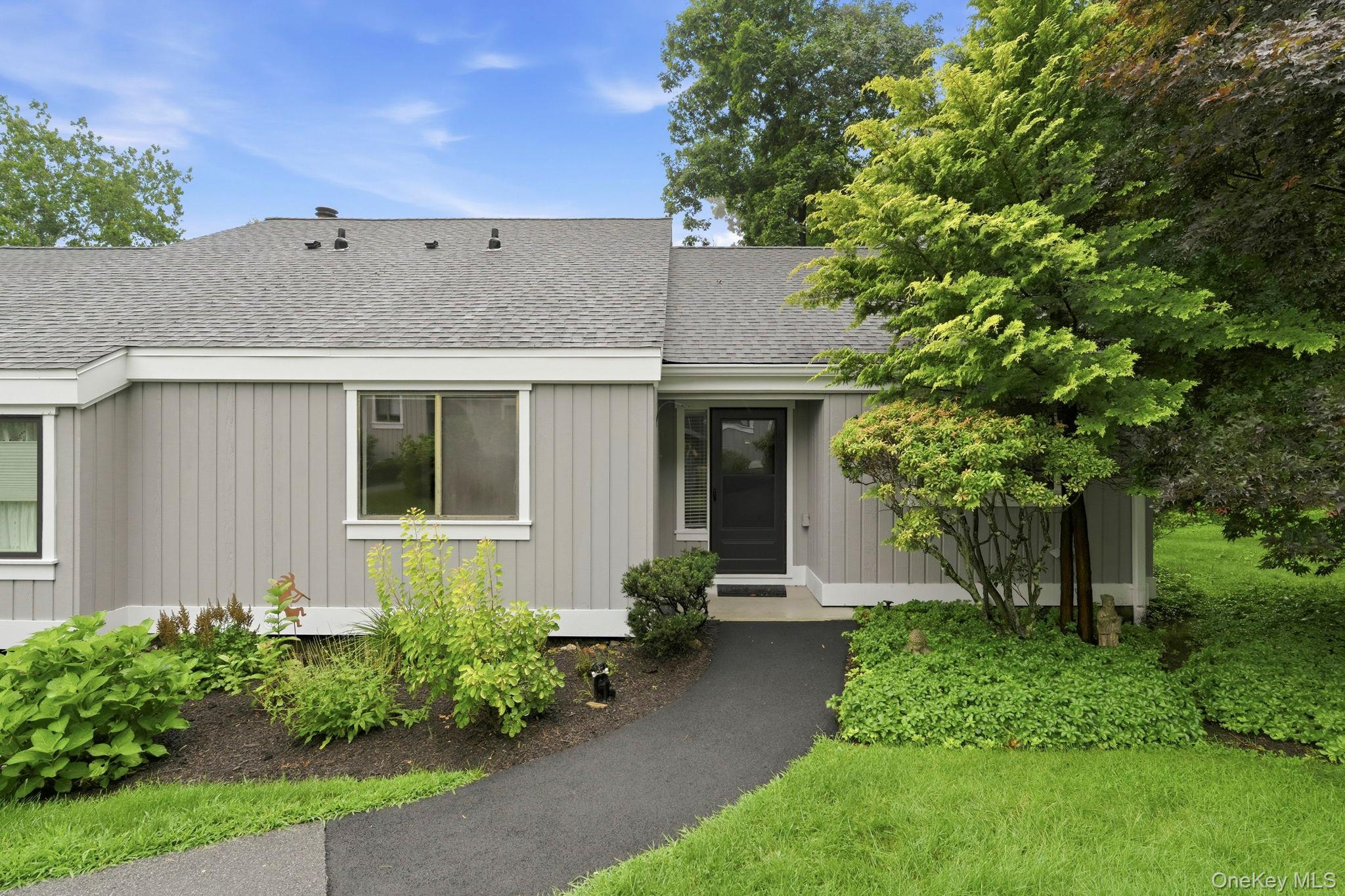 Welcome to easy living at Heritage Hills! This desirable one-level end...