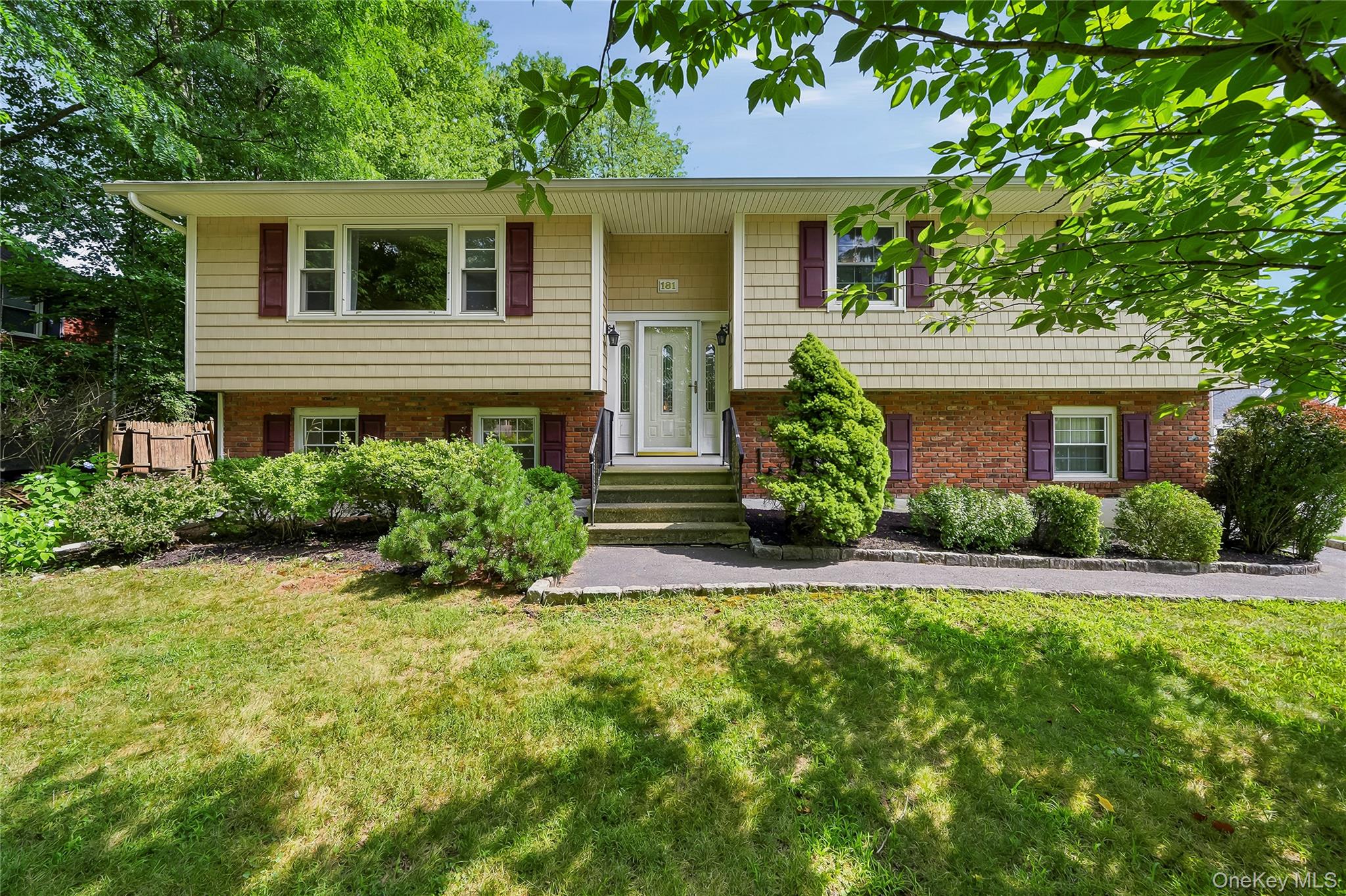 Move Right In! Beautifully maintained Raised Ranch perfectly situated...