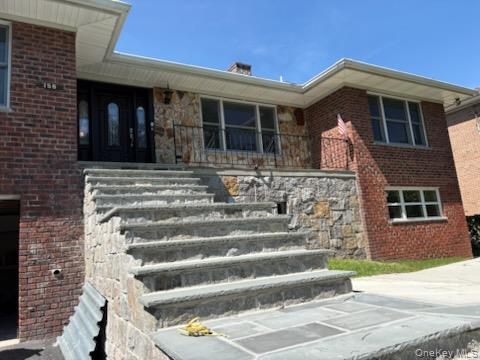 Welcome to this quality custom-built brick home situated on a well-mai...