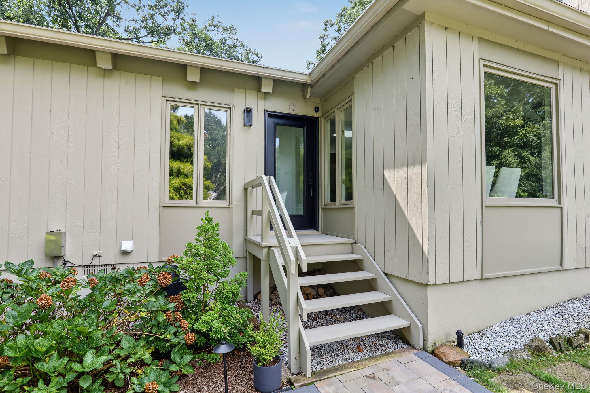 A peaceful contemporary retreat surrounded by nature, this unique home...