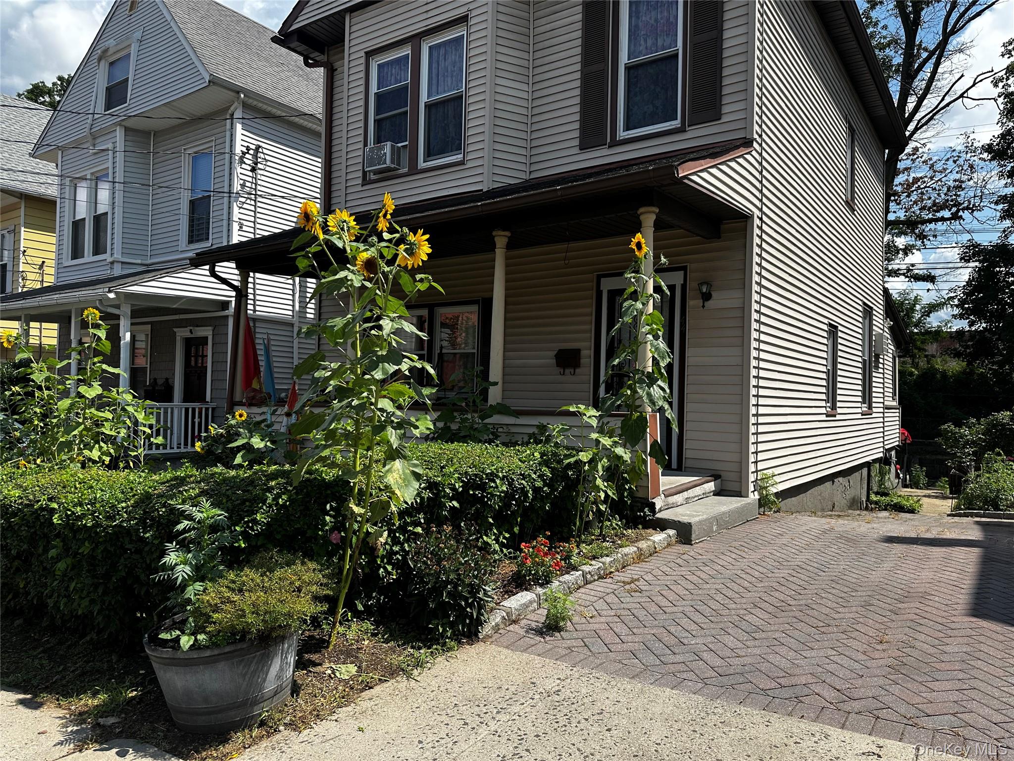 Lovely Colonial offers nice Open Porch for morning and evening quiet r...