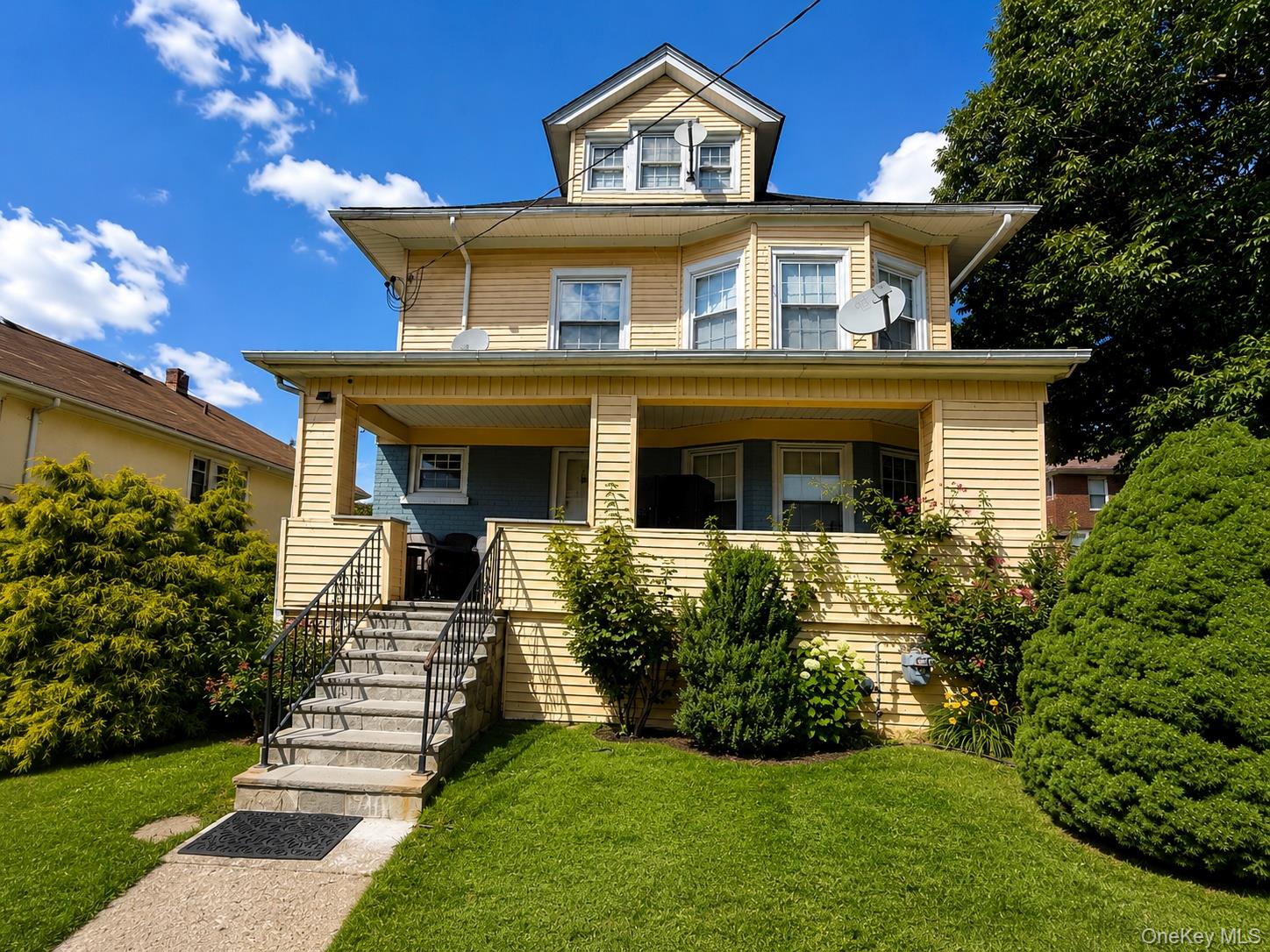 Nestled on a tranquil residential street in White Plains, this classic...