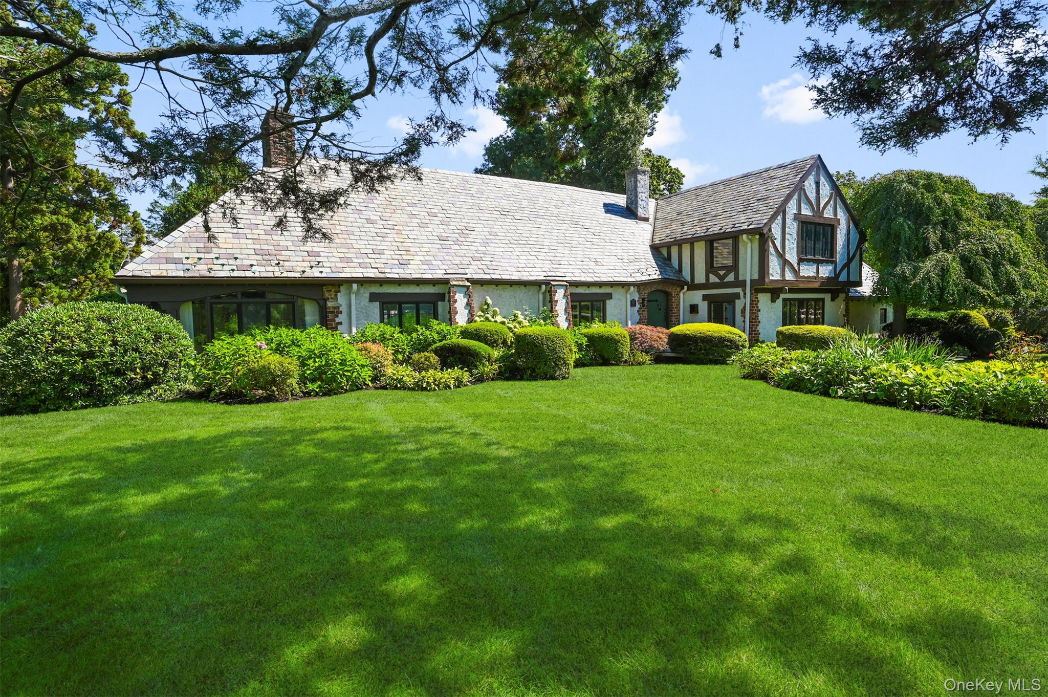 With curb appeal galore, this striking turn-key 4-bedroom, 4-bath home...