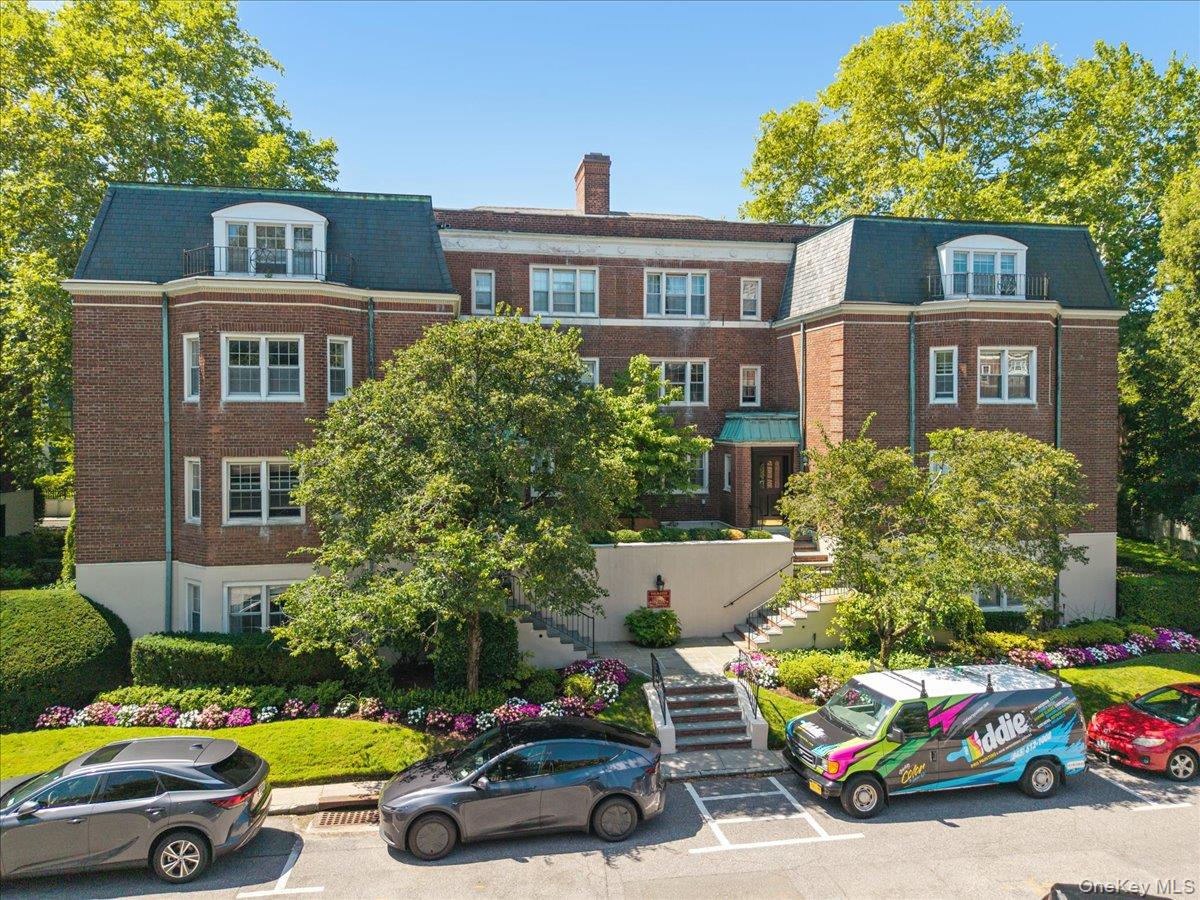 A stone's throw away from Scarsdale Village, this garden style Chateau...