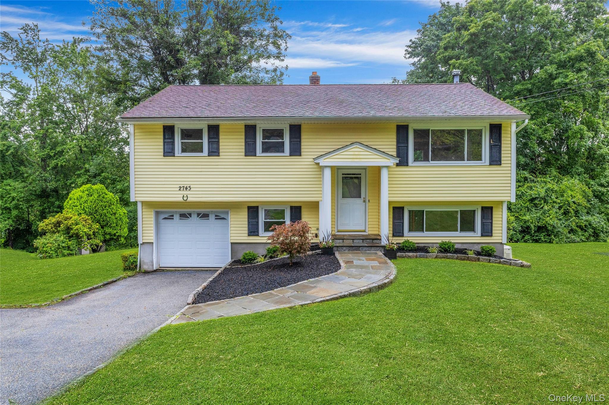 Welcome home to this beautifully maintained Raised Ranch, offering a s...