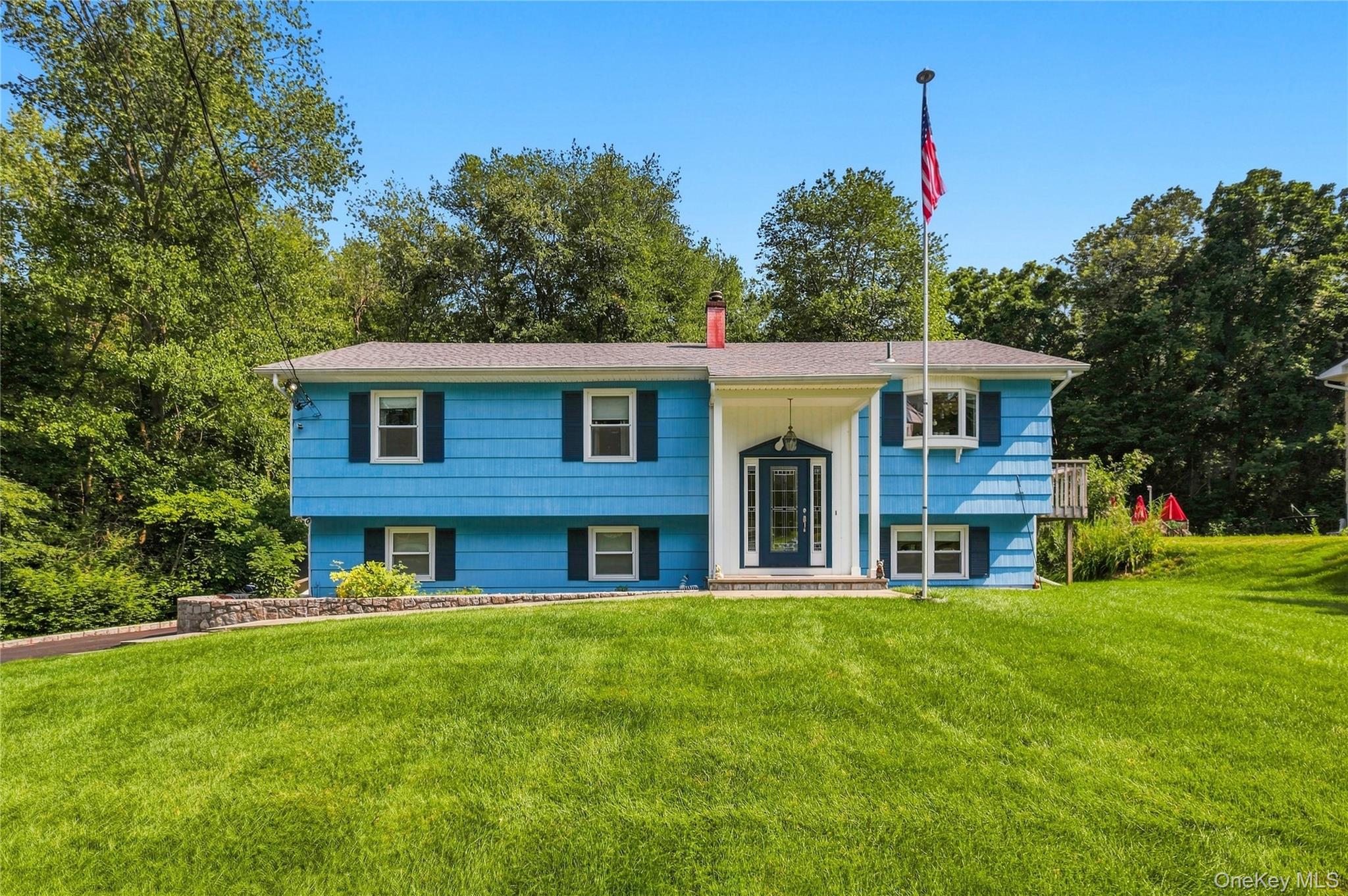 Move right into this beautifully maintained 3-bedroom, 2-bath raised r...