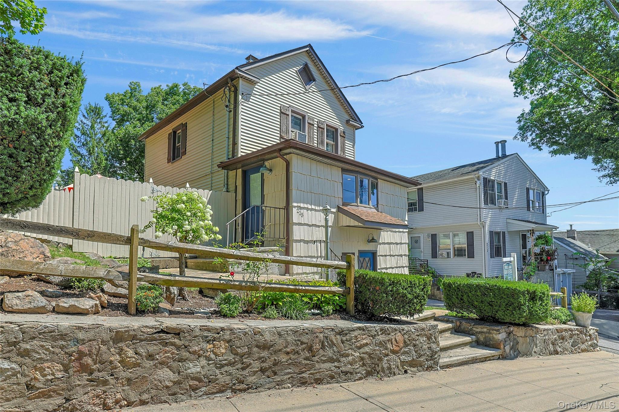 Welcome to 215 Chestnut Street, a stylish Colonial that lives like a t...