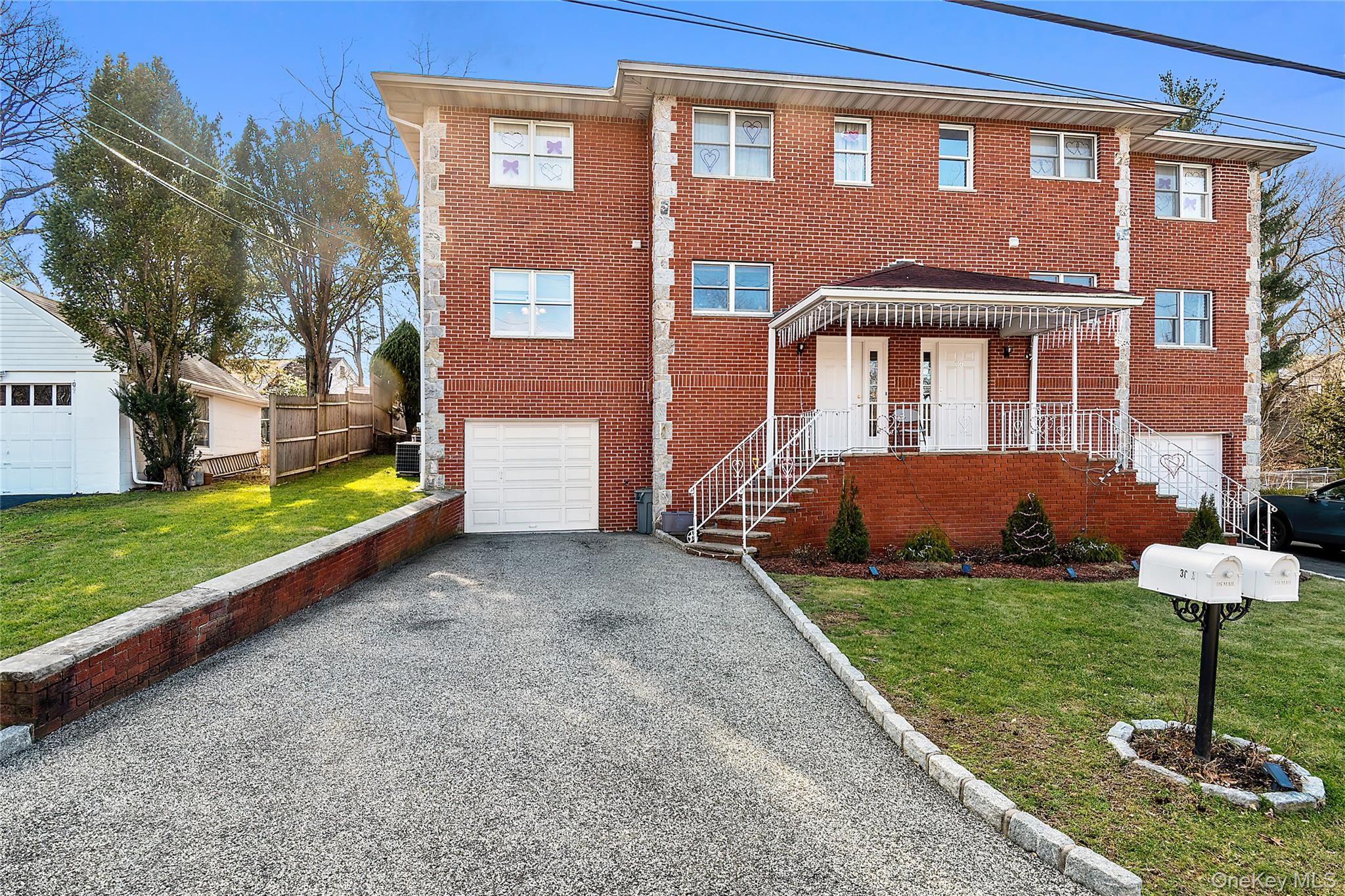 This unit offers a master bedroom and two additional bedrooms with two...
