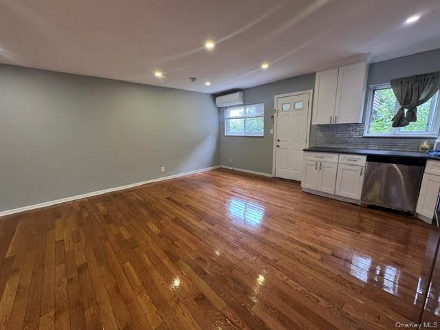 BRICK, SPACE AND INCOME! Welcome to this well-maintained three-story a...