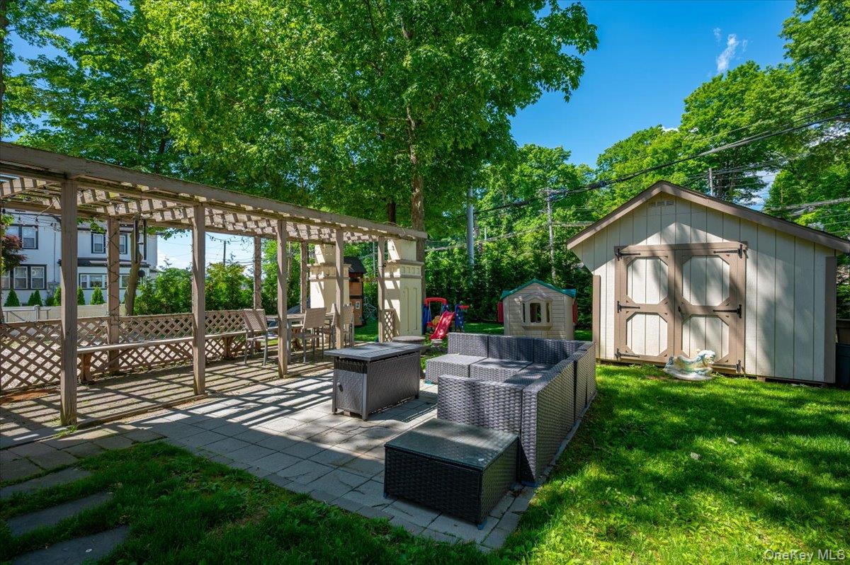 Rare Harbor Heights rental! This Frank Lloyd Wright-inspired Colonial...