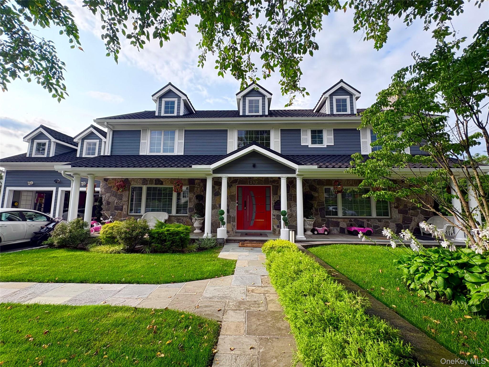 Experience luxury living in this exceptional 4,300 sq. ft. Colonial lo...