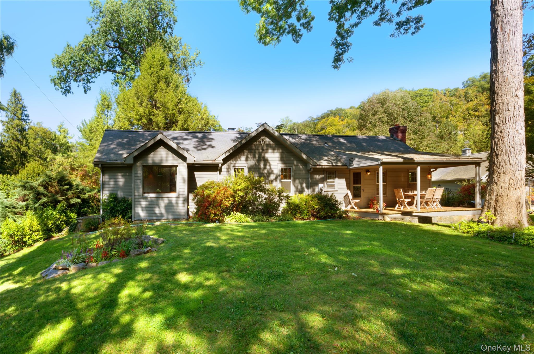 Perfectly set on nearly an acre of beautifully landscaped grounds, thi...