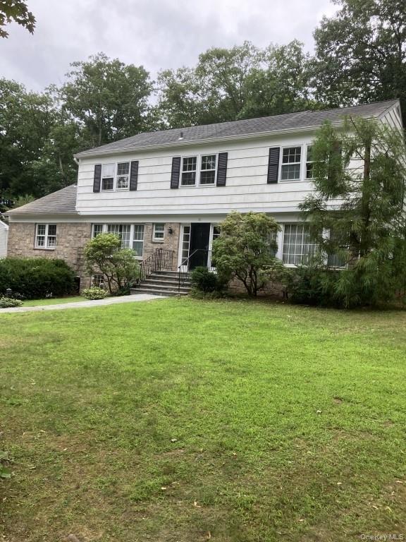 Gracious pet-friendly 5 bedroom 3 1/2 bath center hall colonial on .35...