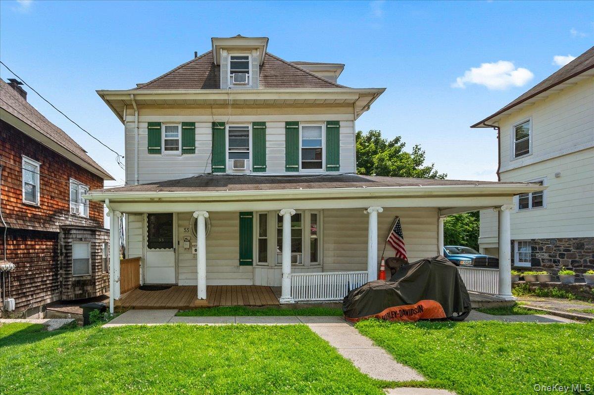 Classic two-family home offering an outstanding opportunity for both i...