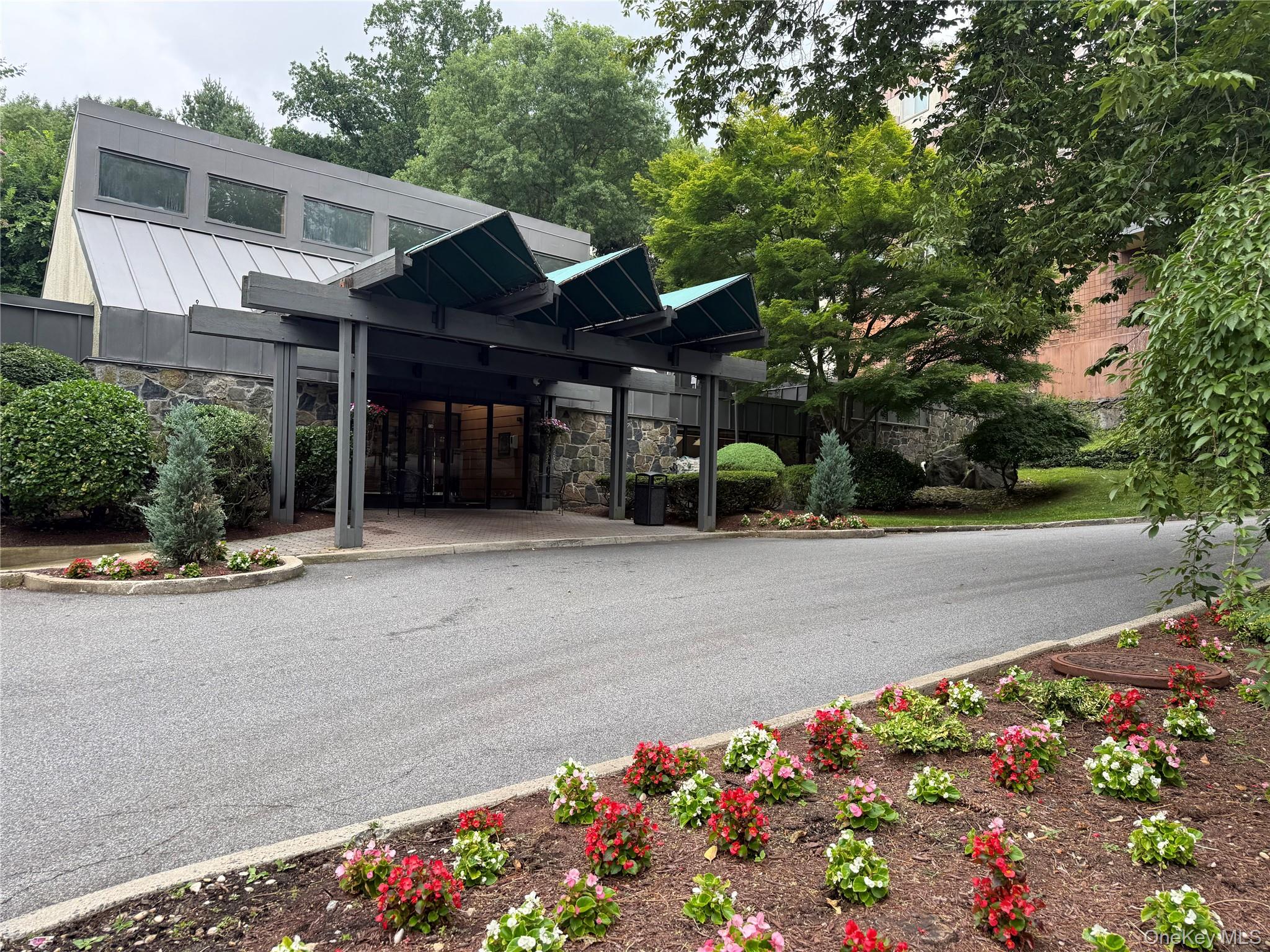 Welcome to The Fountainhead in Scarsdale! This bright and spacious one...