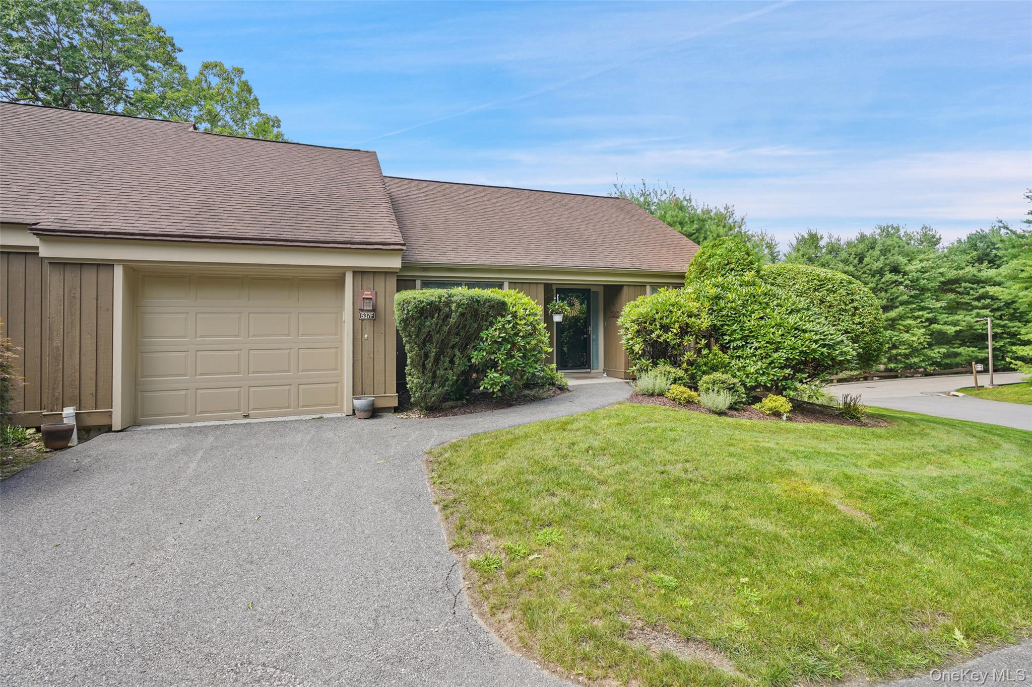 Beautiful one-level Armonk end unit offering 2 bedrooms, 2 full baths,...