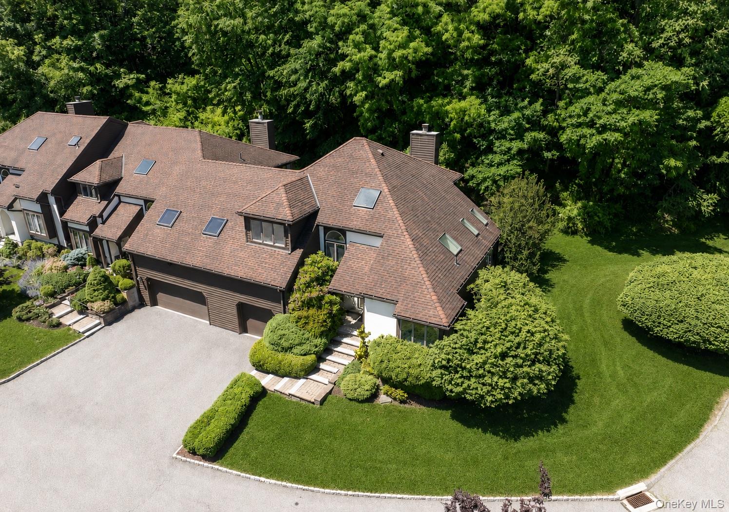 Welcome to this thoughtfully updated and impeccably maintained end-uni...