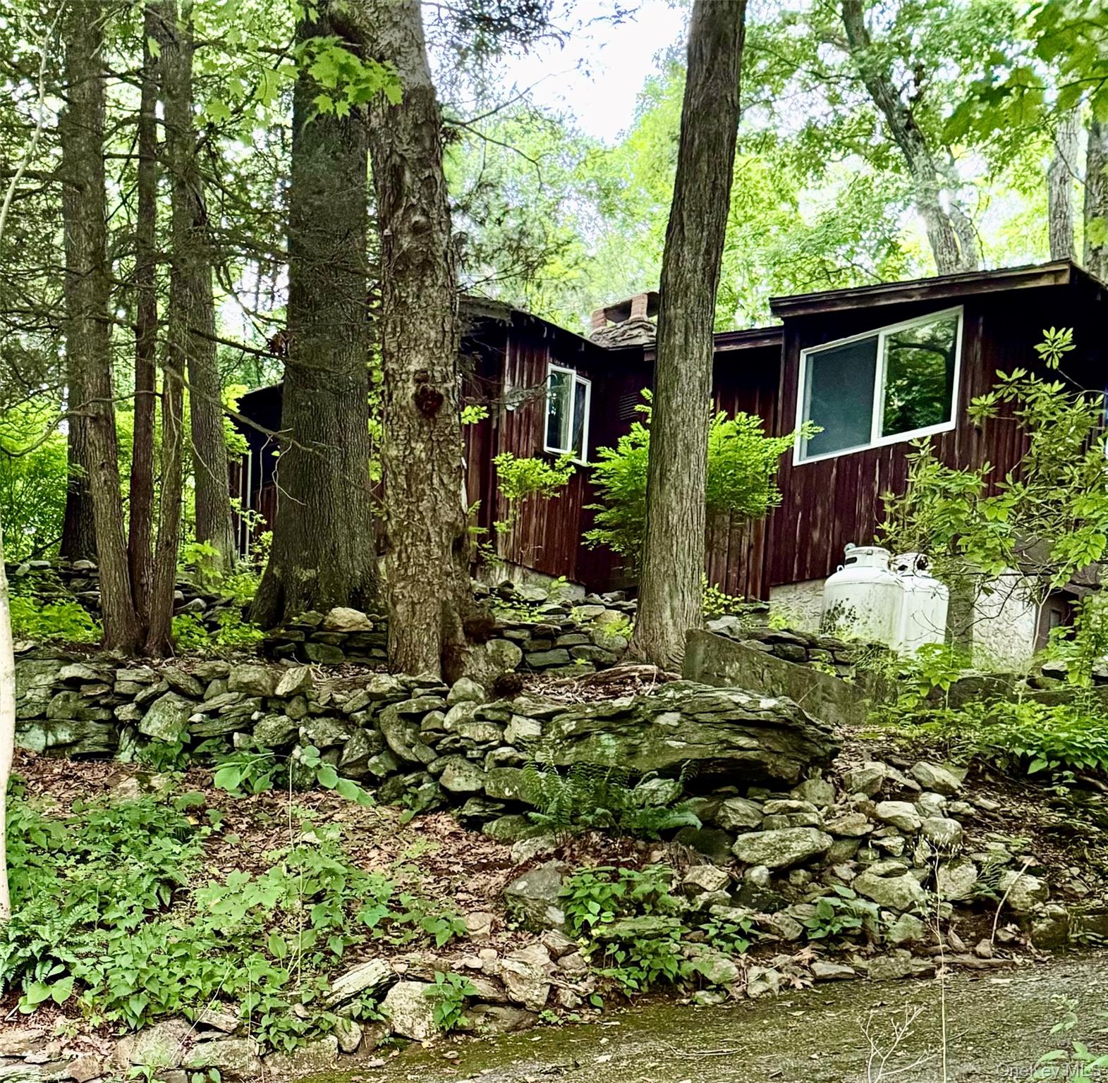 Built in 1933, this 630 SF, 3 room cabin features a living room with o...