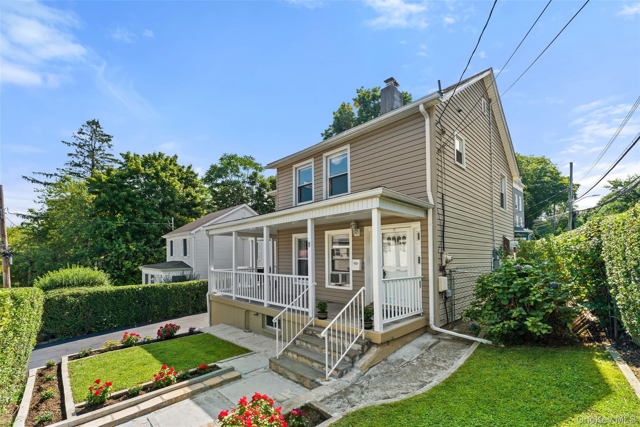 Charming three-bedroom Colonial ideally located on a quiet residential...