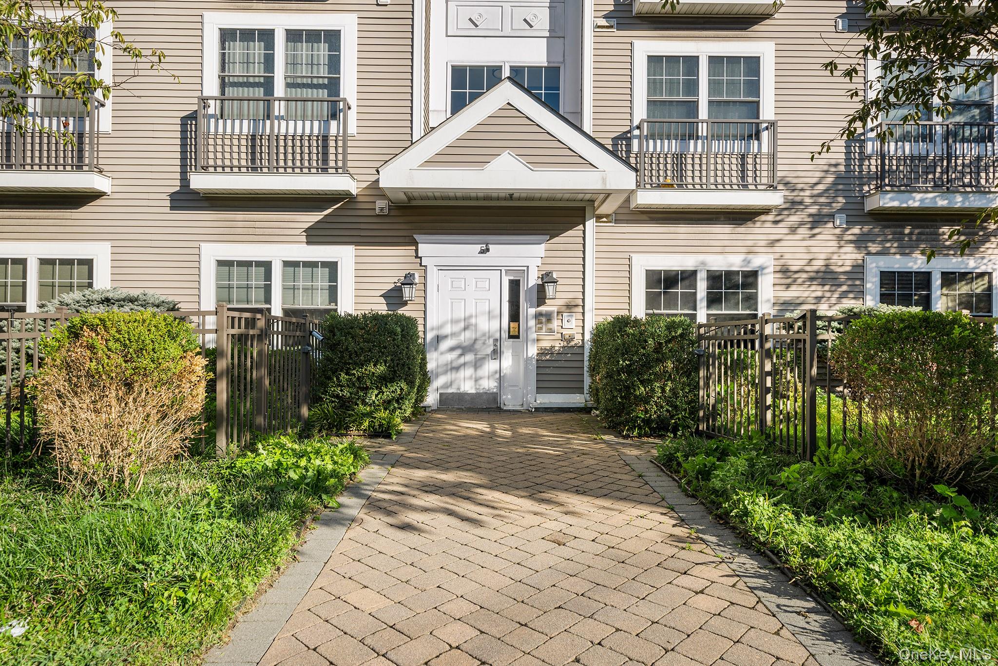 Exceptional opportunity to own this well-maintained end-unit condomini...