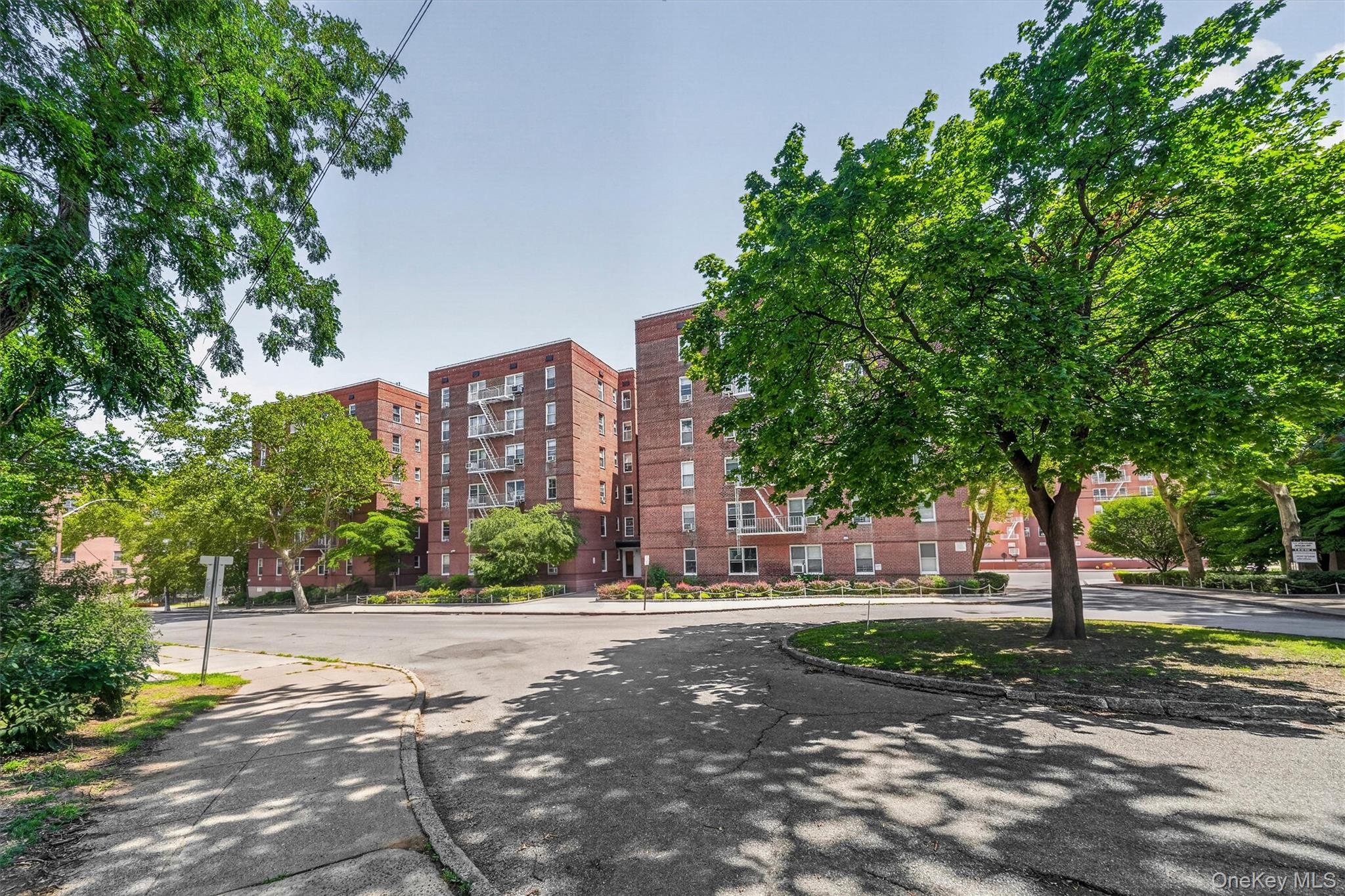 Welcome home to this sun-drenched, turn-key corner apartment featuring...